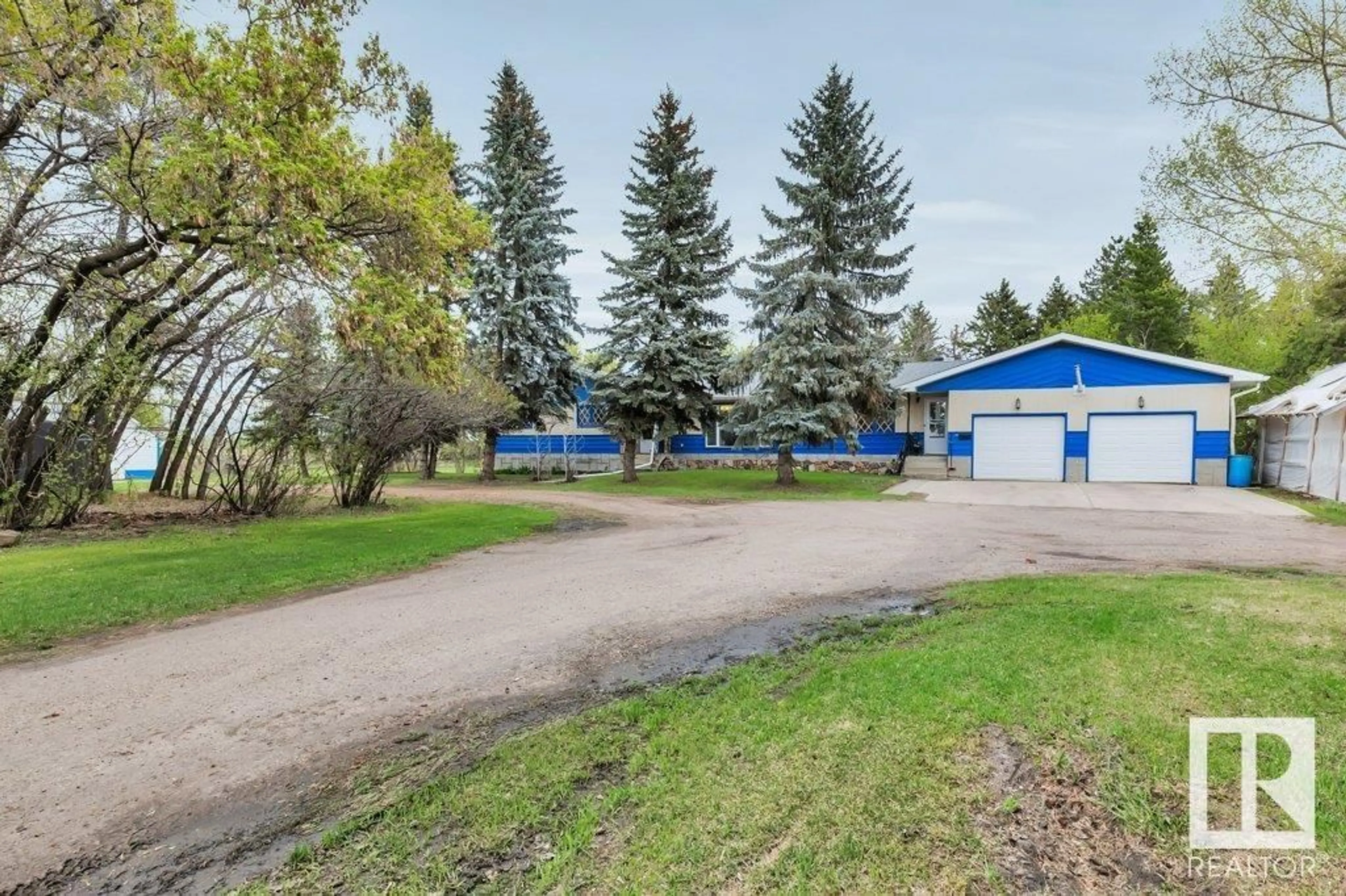 A pic from exterior of the house or condo, the street view for 461037A RGE RD 243, Rural Wetaskiwin County Alberta T9A1W8