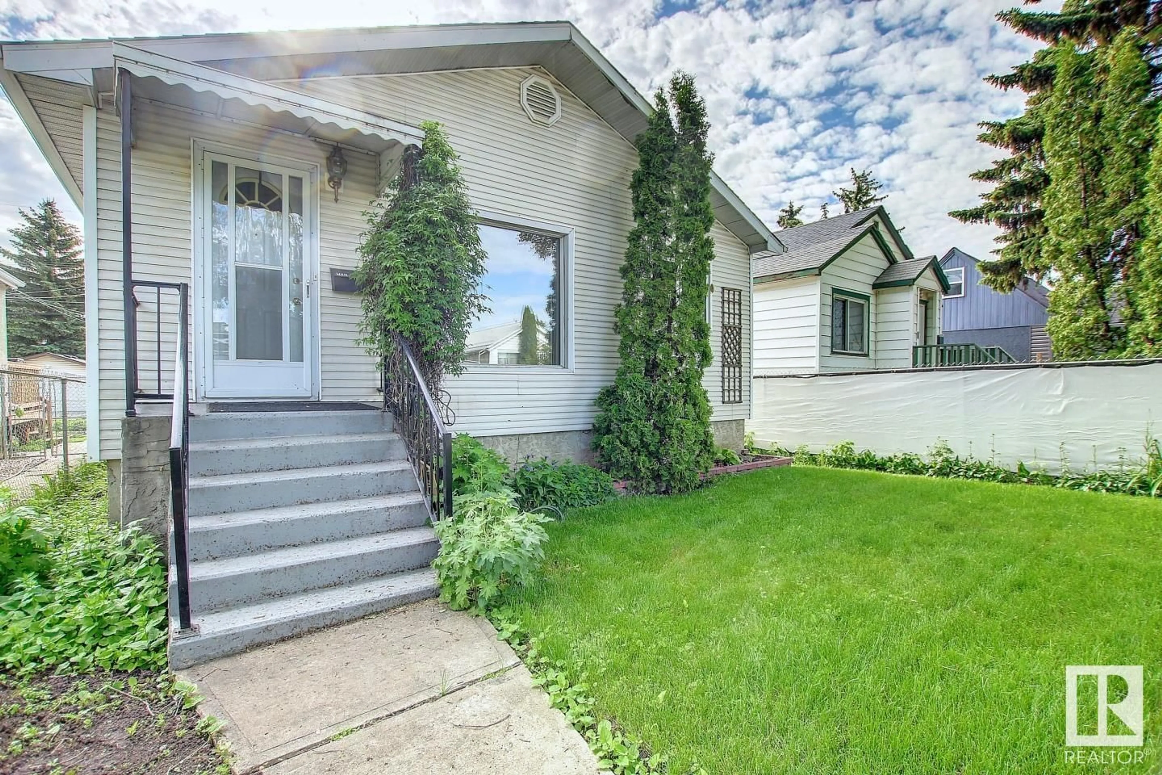 Frontside or backside of a home for 12011 77 ST NW, Edmonton Alberta T5B2G6