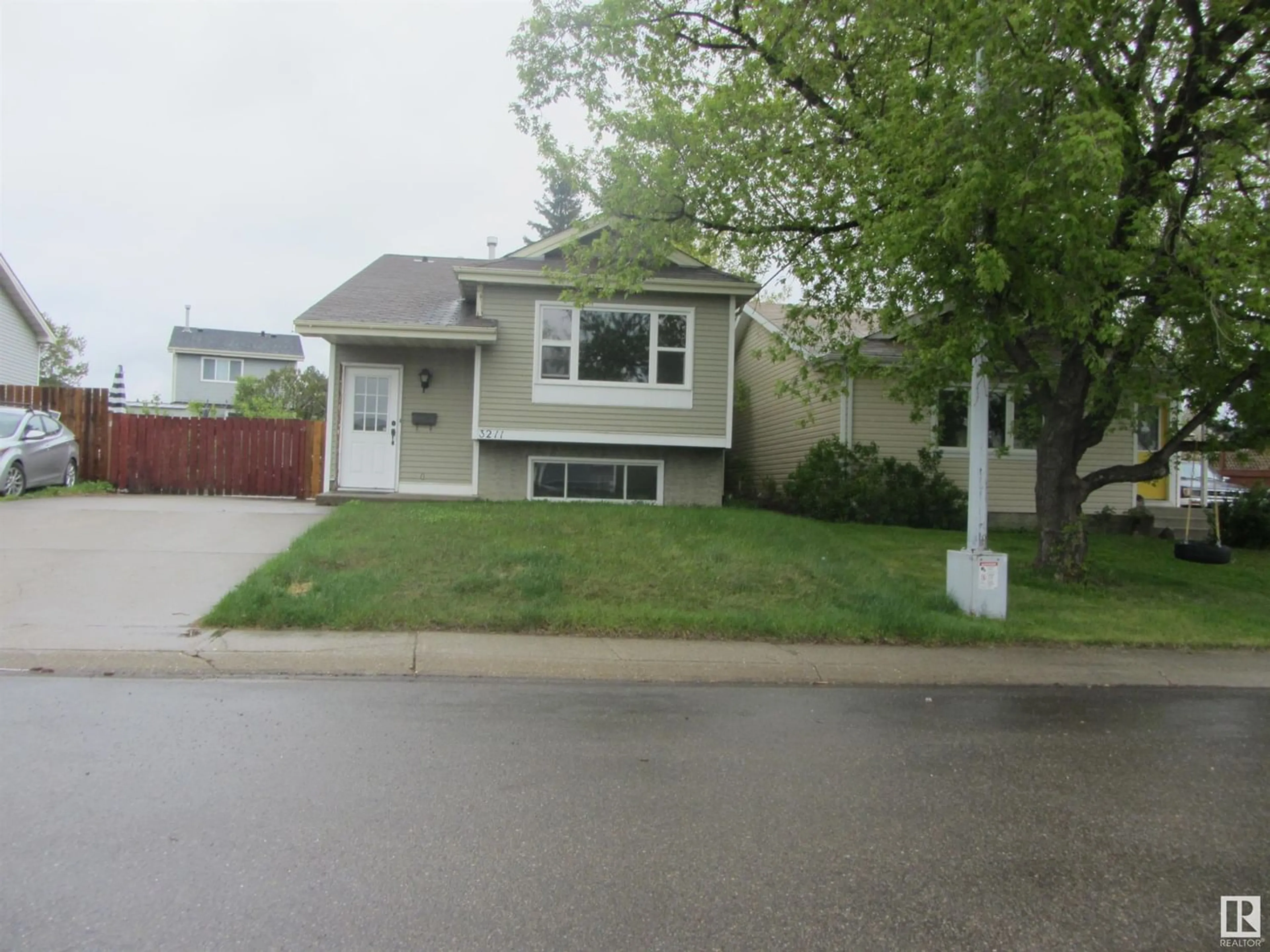 Frontside or backside of a home for 3211 47 ST NW, Edmonton Alberta T6L4R9