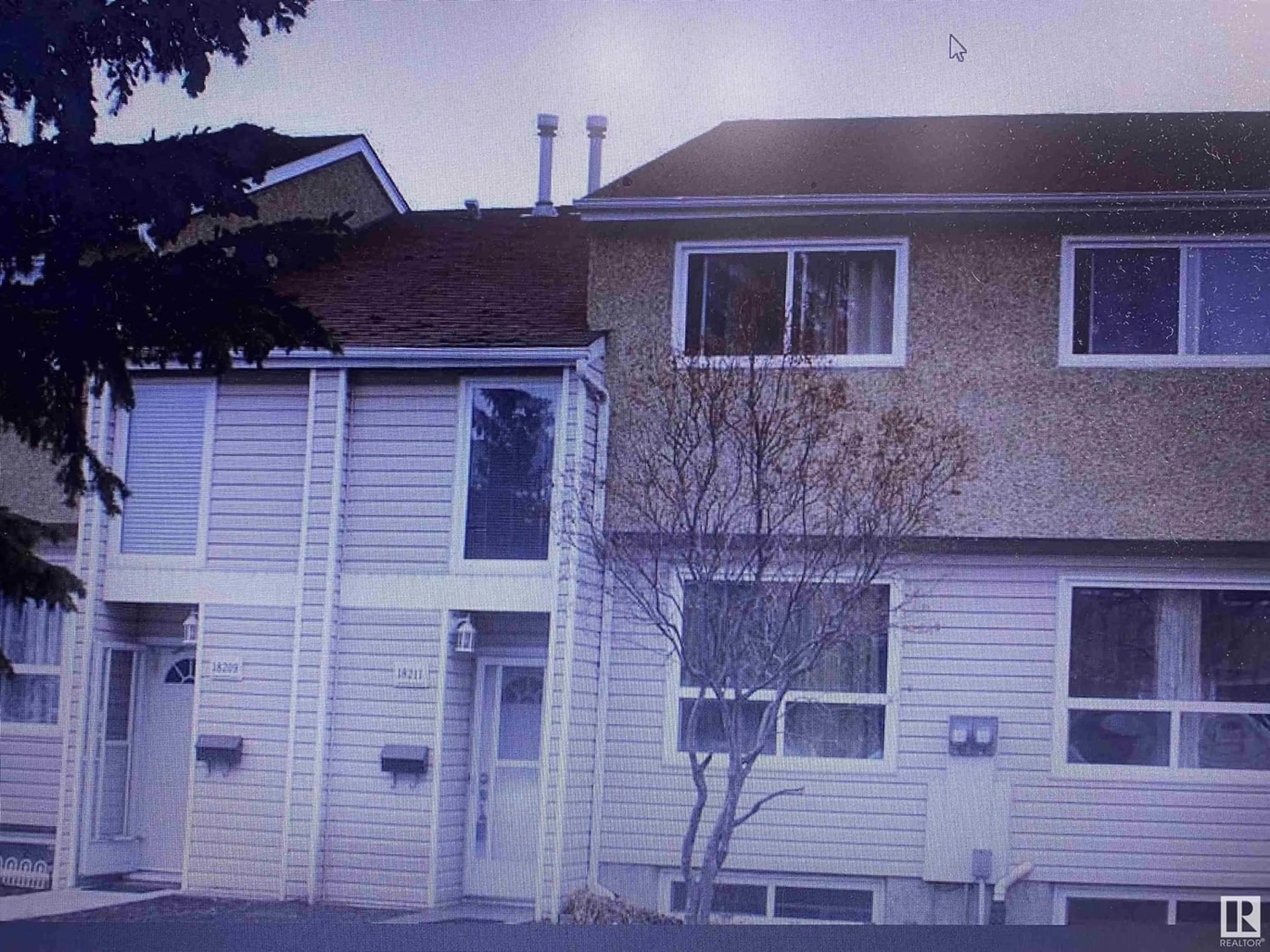 A pic from exterior of the house or condo for 18211 93 AV NW, Edmonton Alberta T5T1Y2