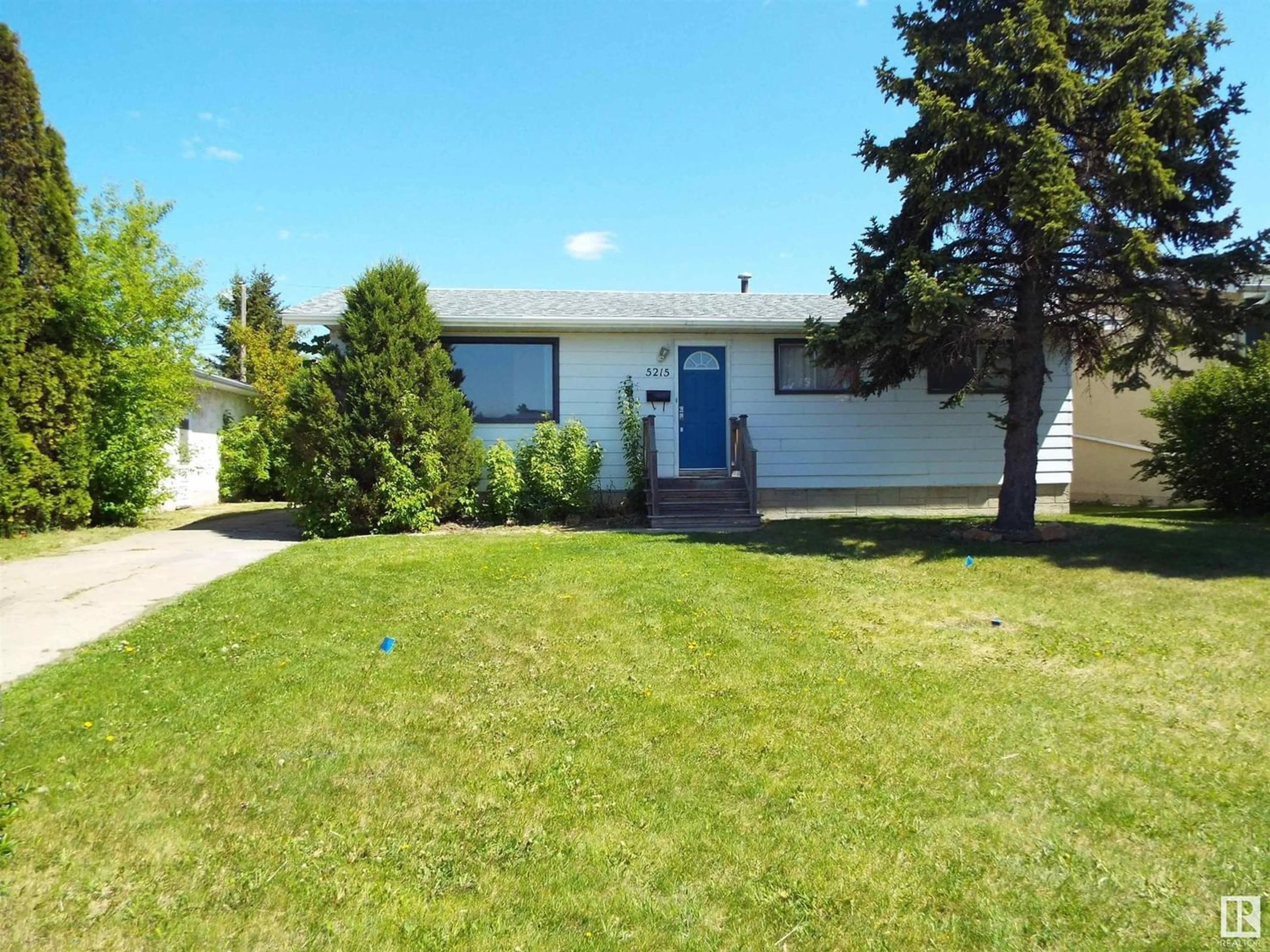 Frontside or backside of a home for 5215 52 ST, Leduc Alberta T9E5L9