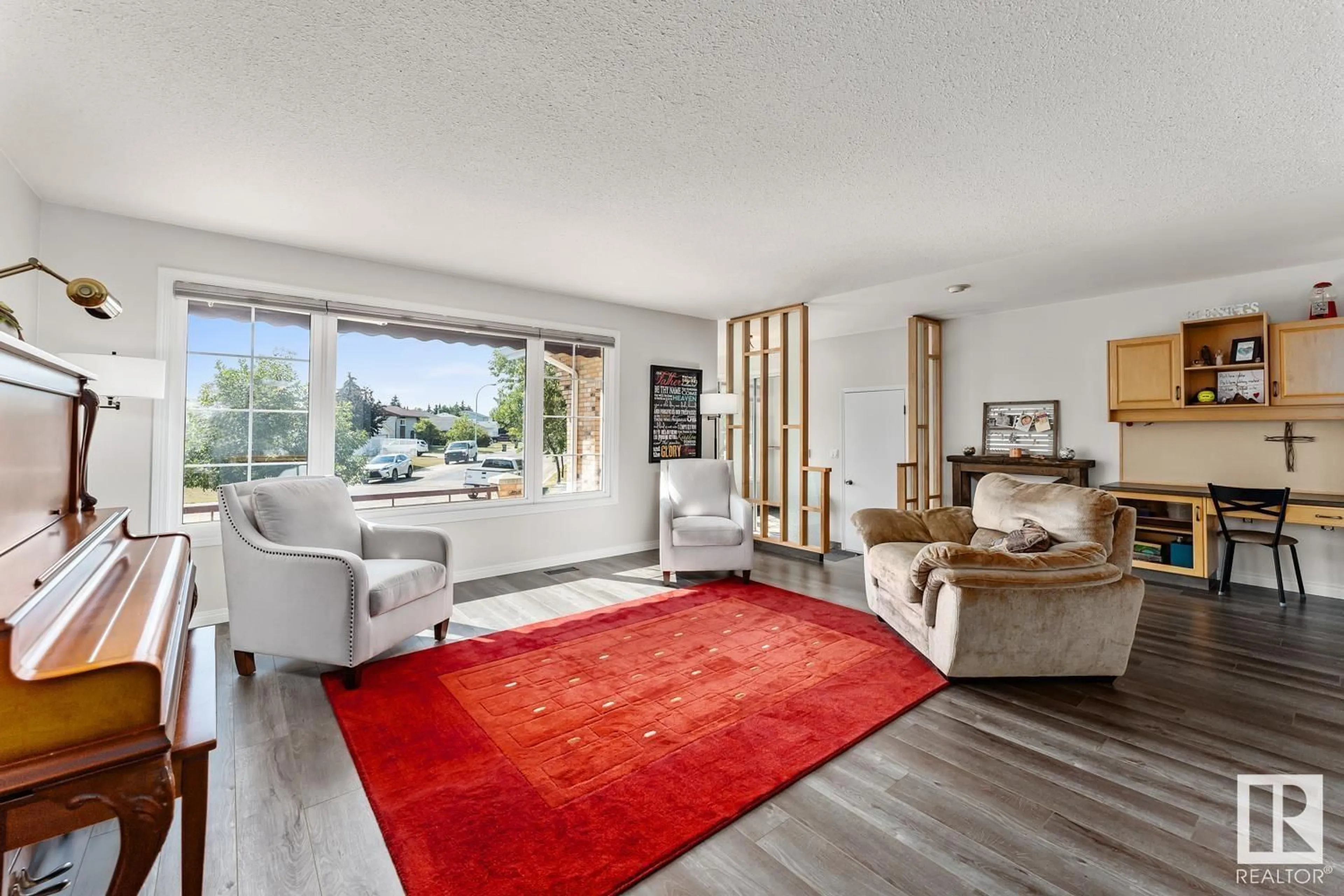 Living room, wood floors for 4415 46 AV, Bonnyville Town Alberta T9N1L8