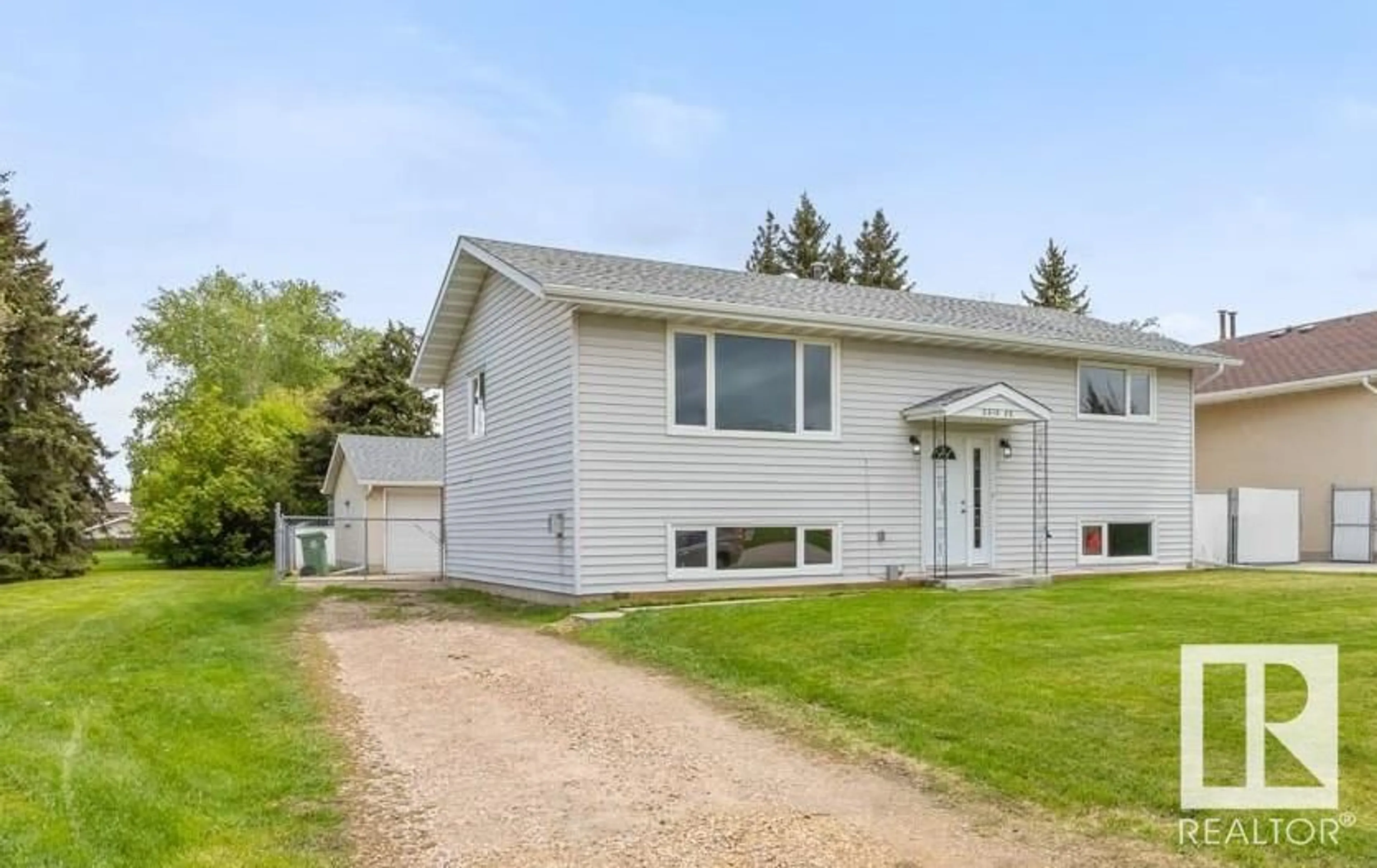 Frontside or backside of a home for 5513 52 ST, Leduc Alberta T9E5P6