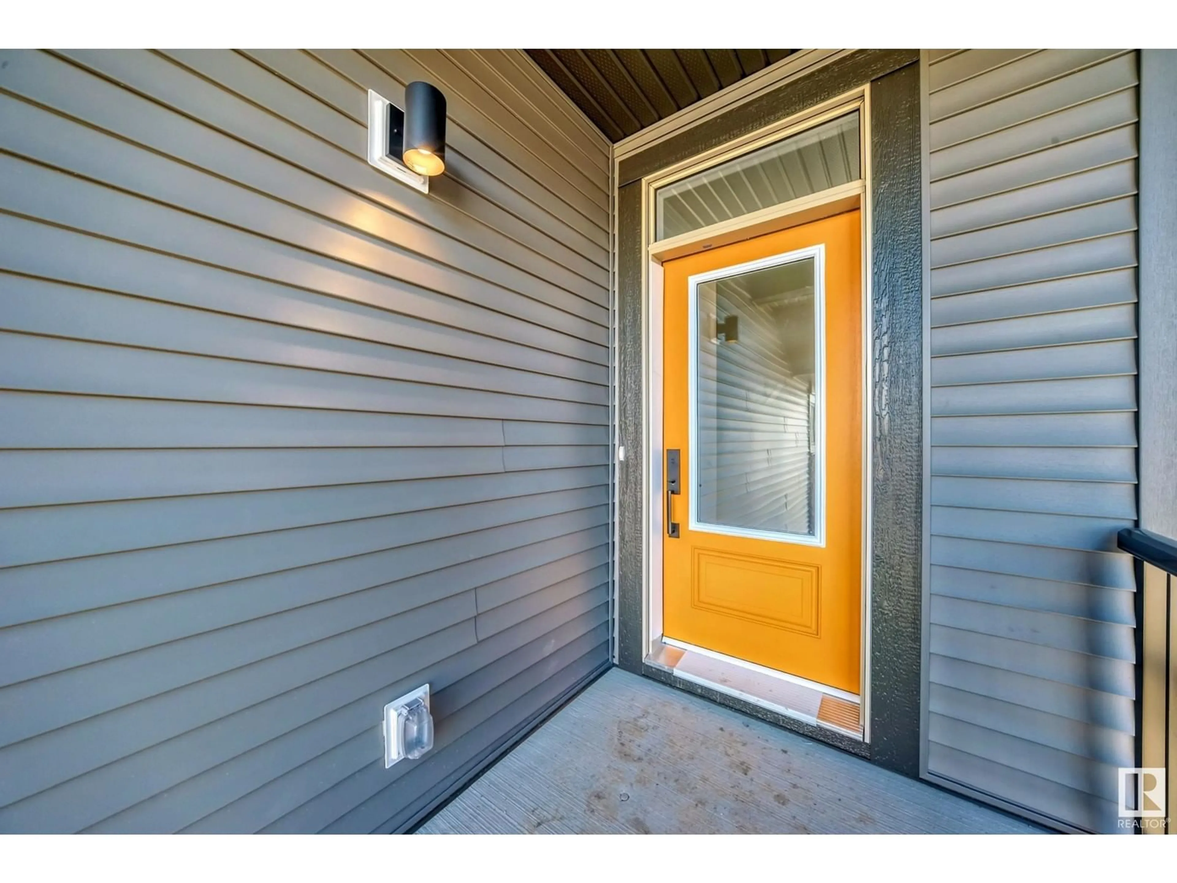 Indoor entryway, wood floors for 1401 AINSLIE WD SW, Edmonton Alberta T6W2L9