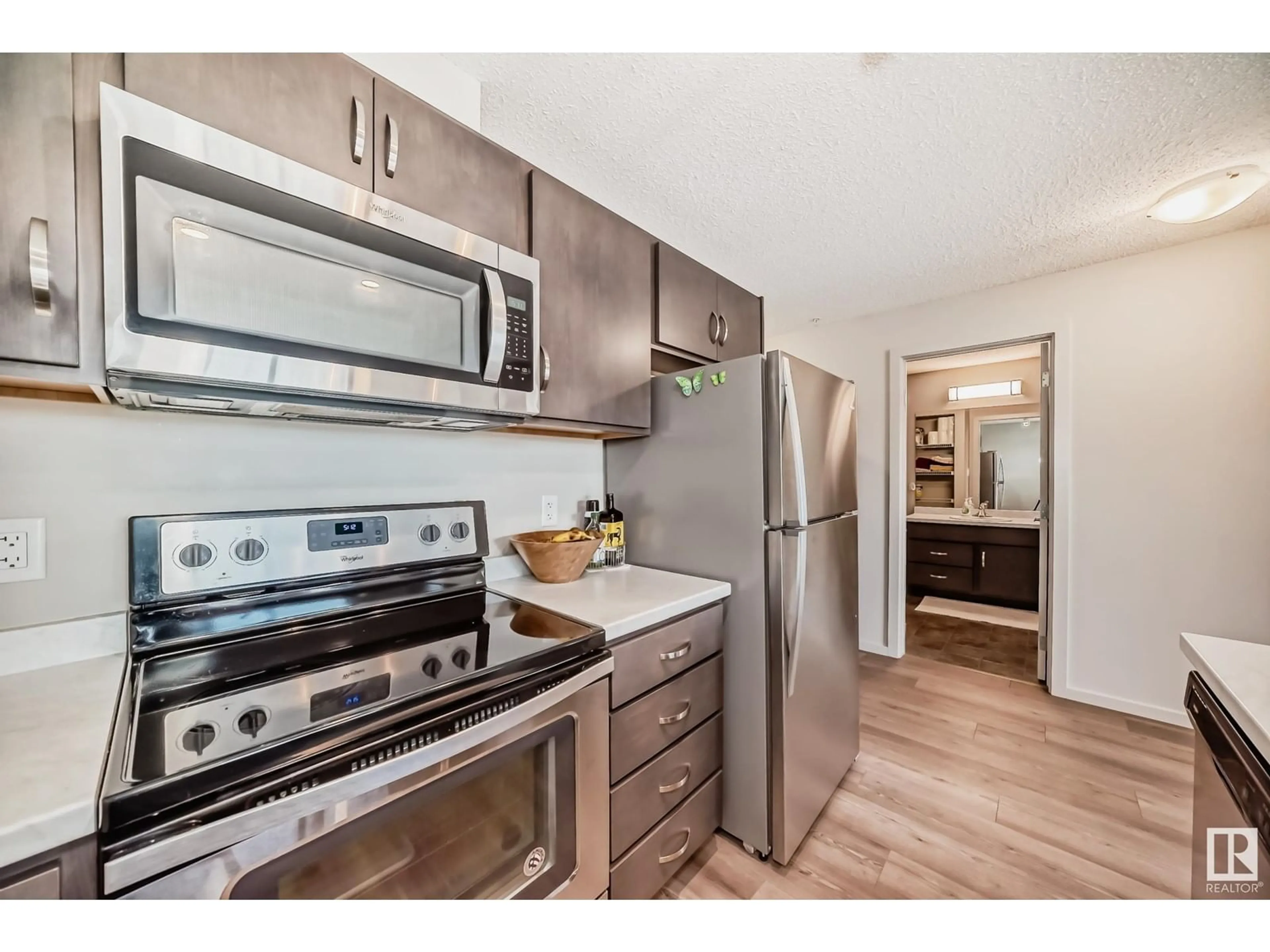 Standard kitchen, wood floors for #218 5404 7 AV SW, Edmonton Alberta T6X2K4