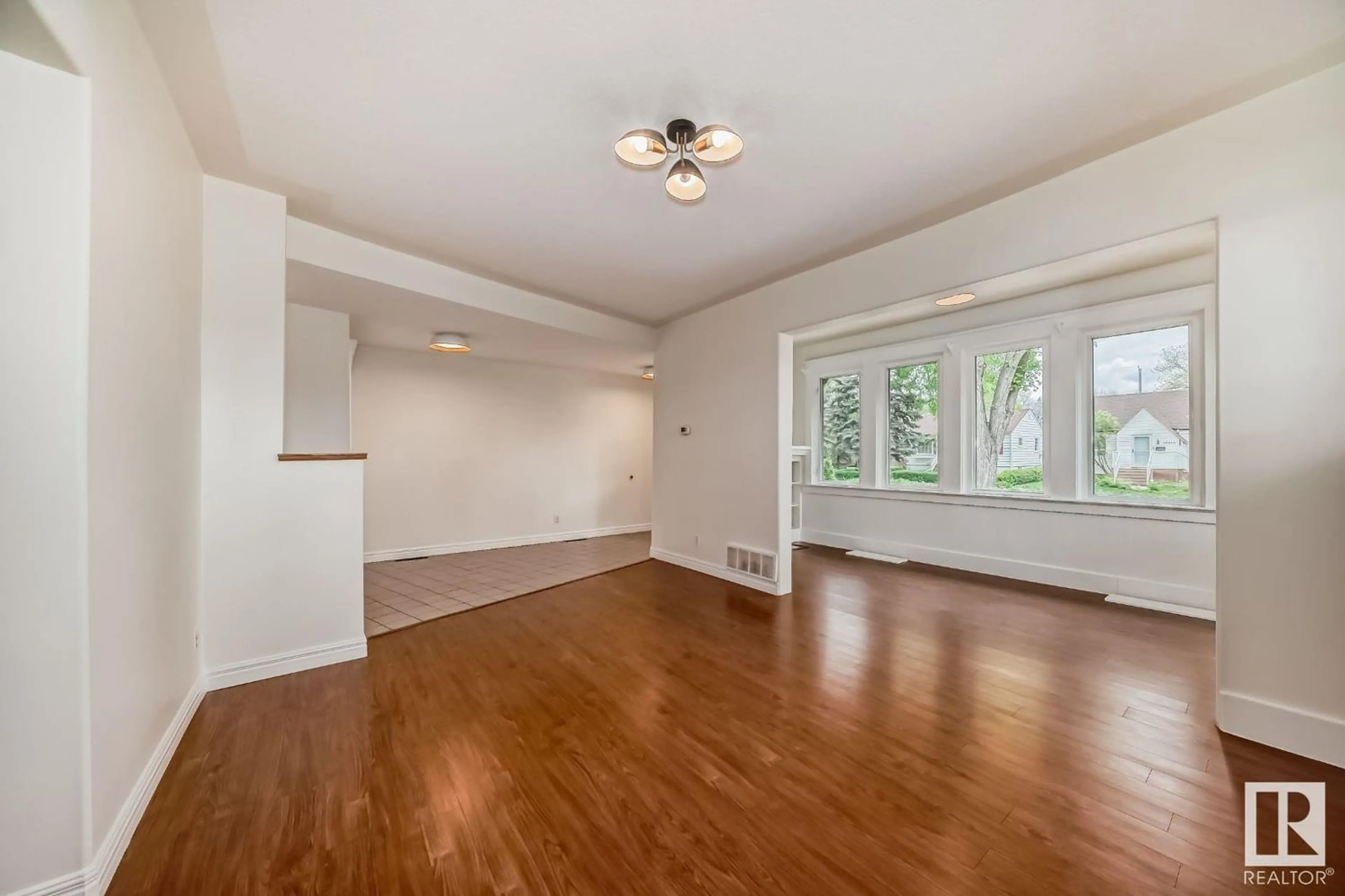 A pic of a room, wood floors for 10514 128 ST NW, Edmonton Alberta T5N1W4