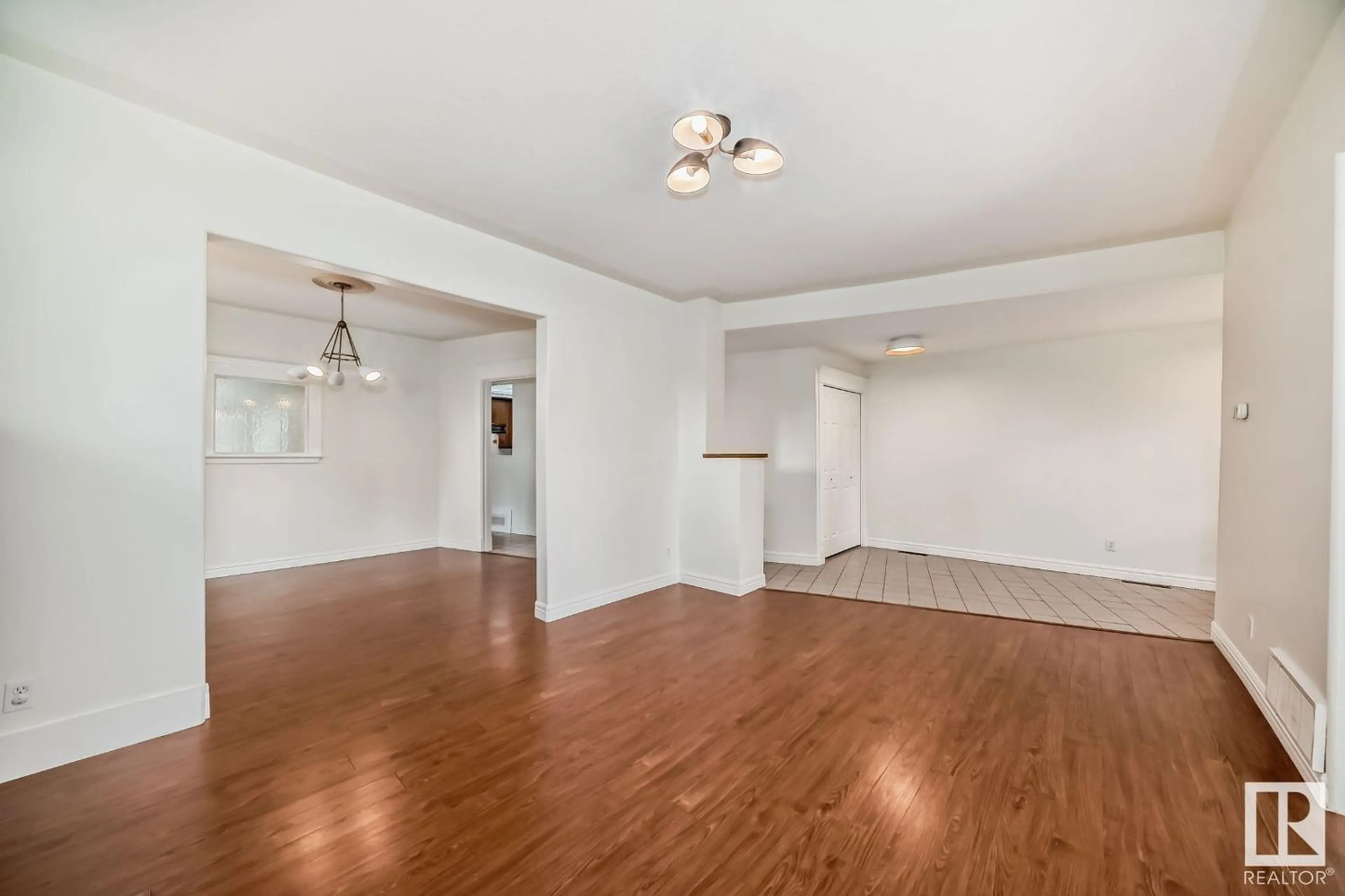 A pic of a room, wood floors for 10514 128 ST NW, Edmonton Alberta T5N1W4