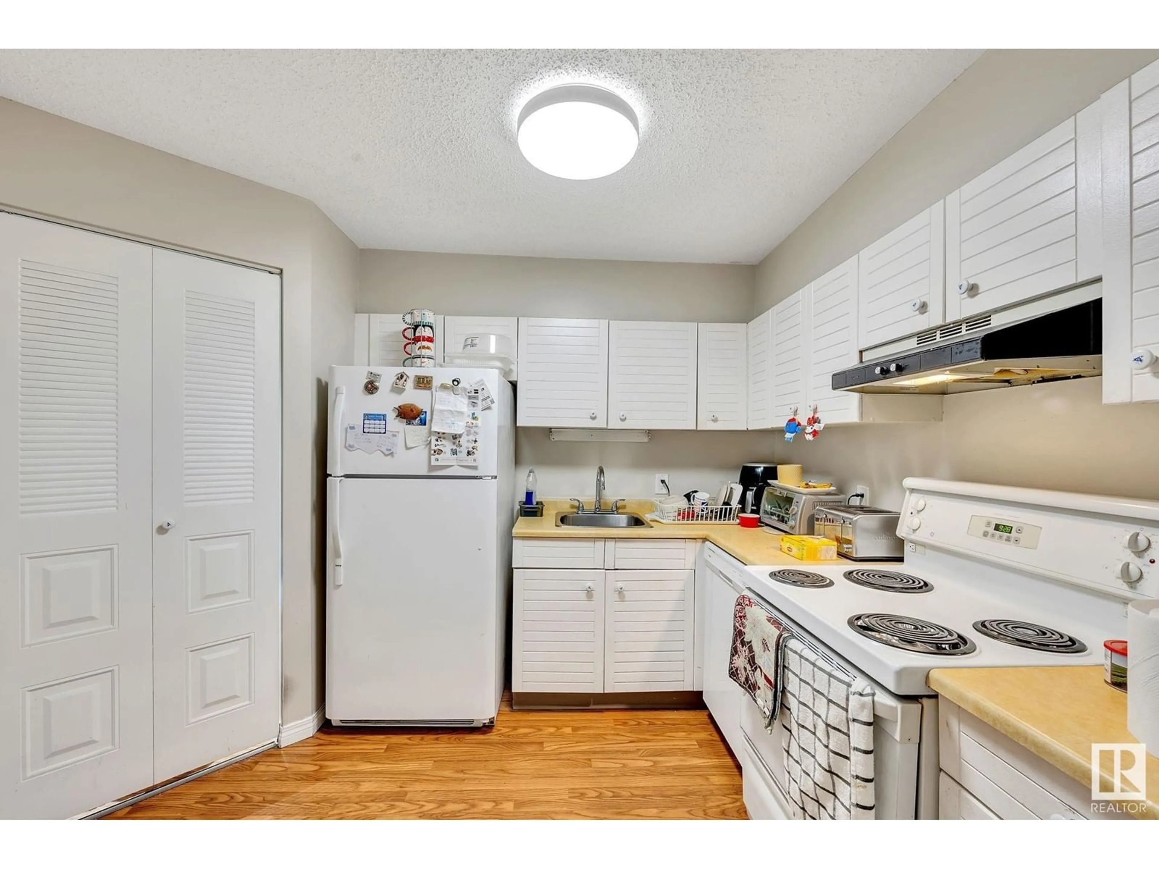 Standard kitchen, wood floors for #204 10149 Saskatchewan DR NW NW, Edmonton Alberta T6E6B6