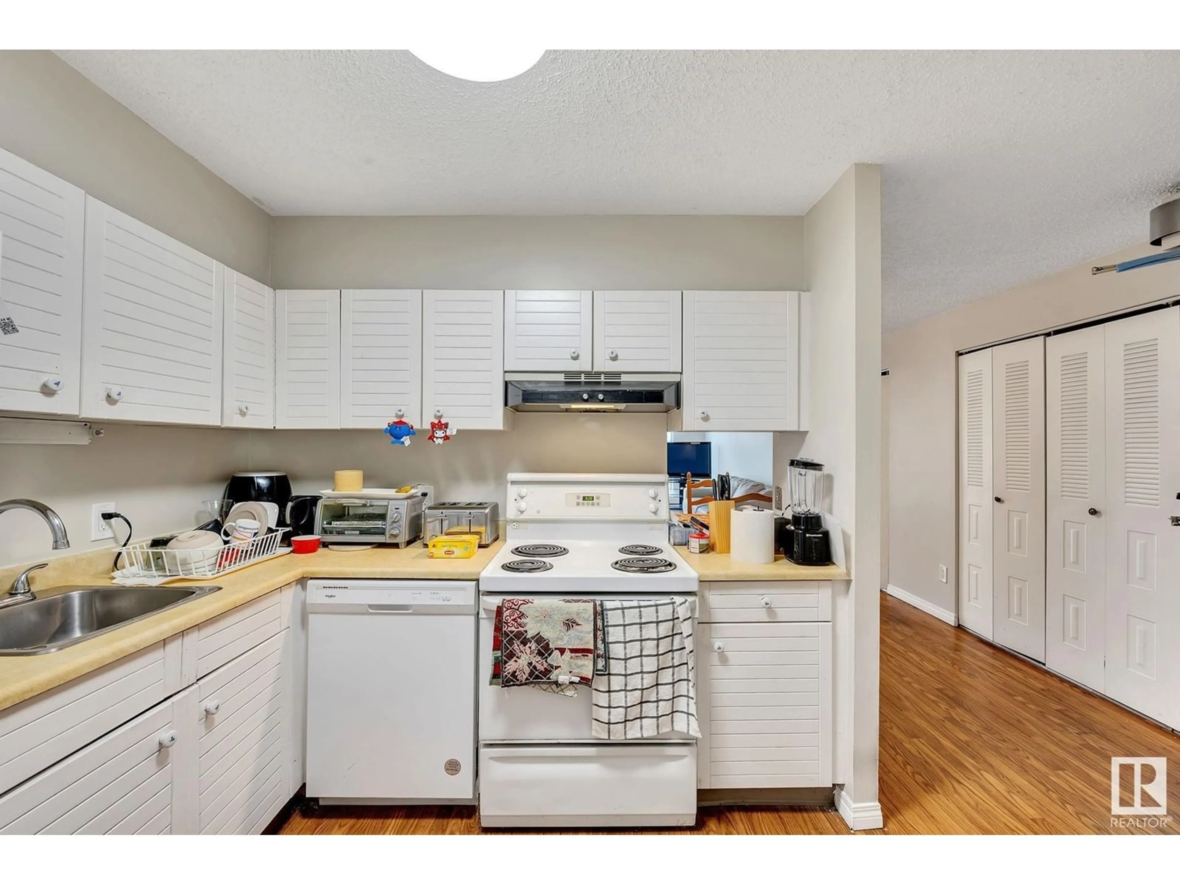 Standard kitchen, wood floors for #204 10149 Saskatchewan DR NW NW, Edmonton Alberta T6E6B6