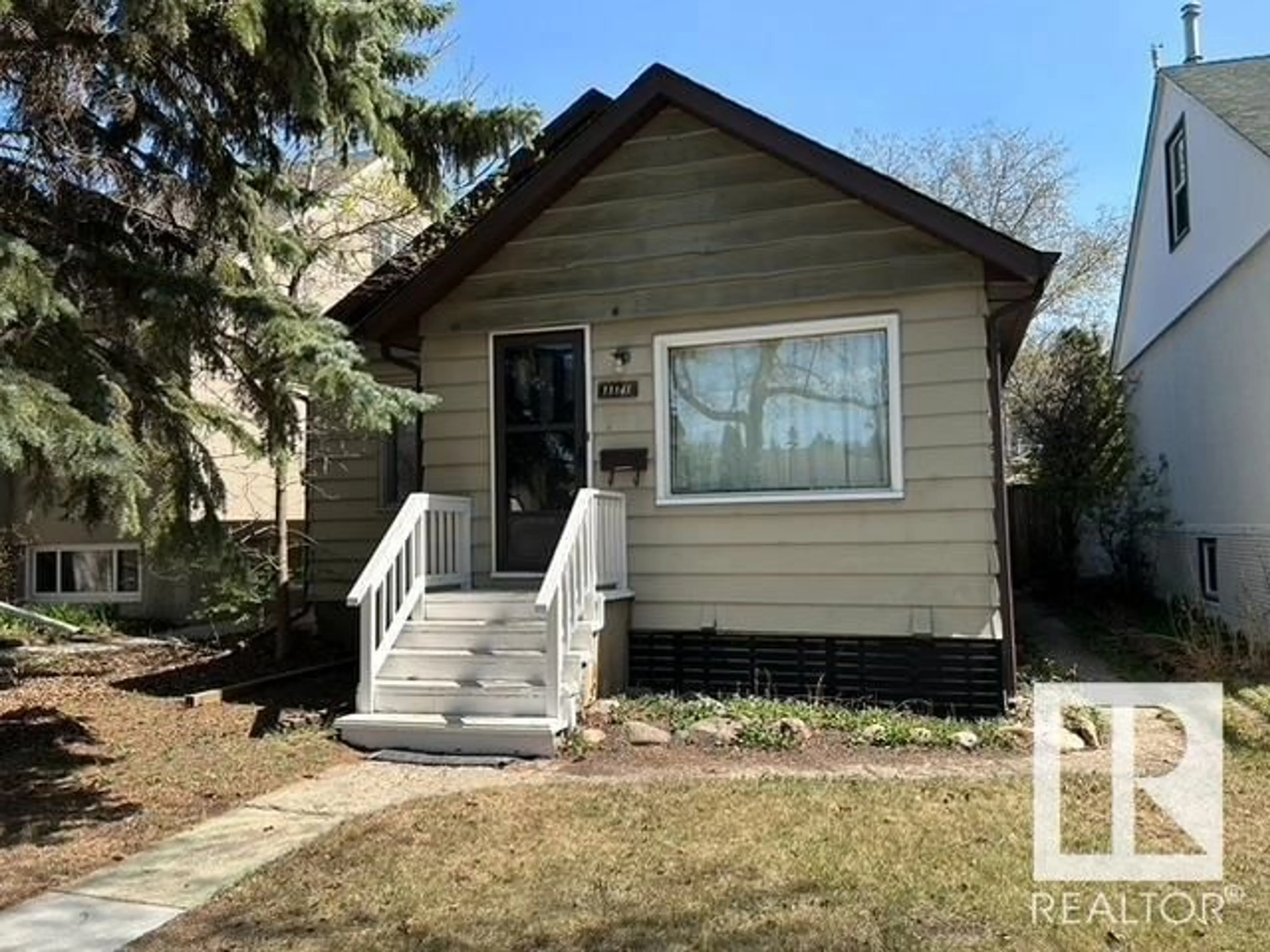 Frontside or backside of a home for 11141 53 ST NW, Edmonton Alberta T5W3K6