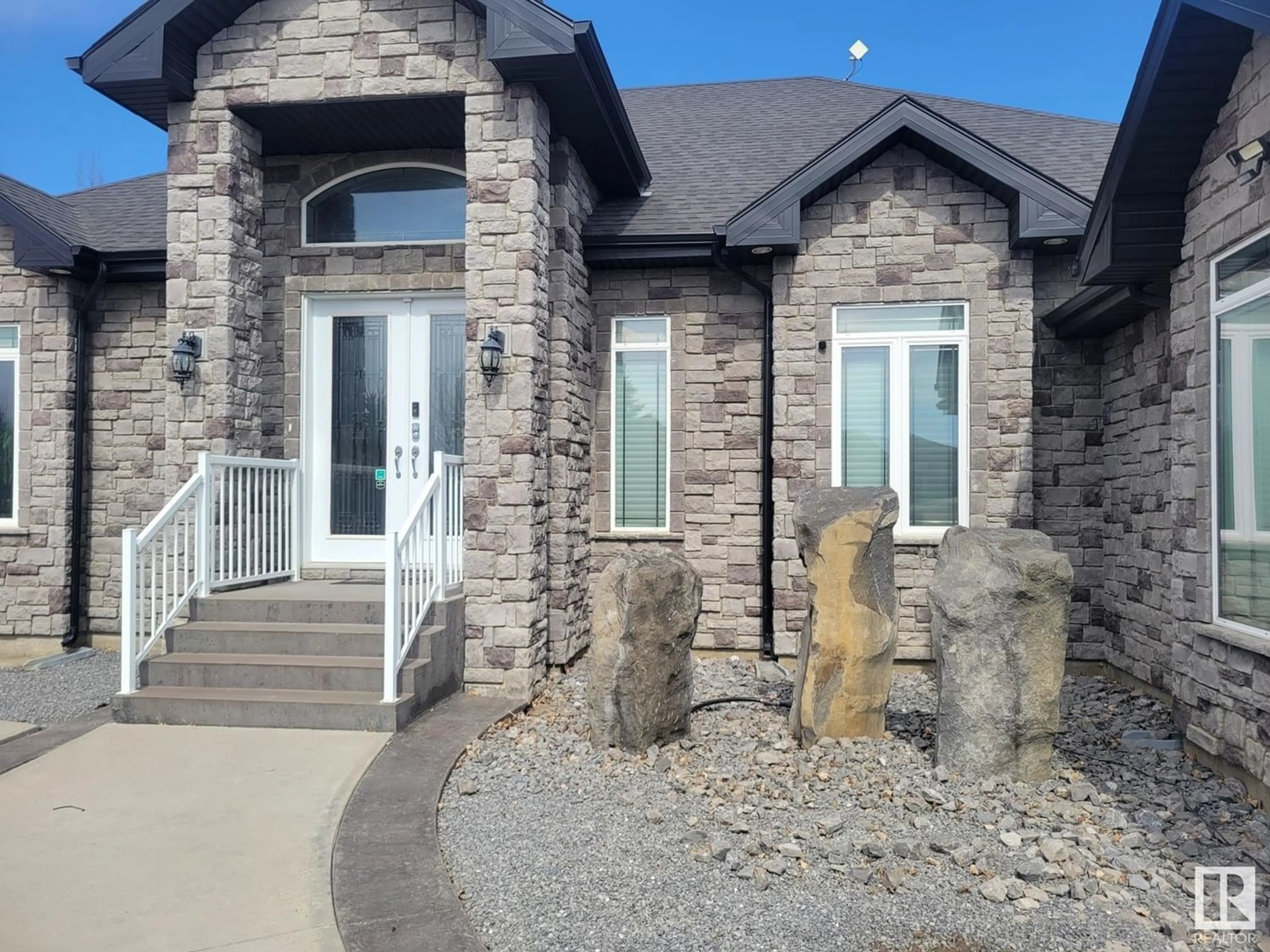 Frontside or backside of a home for 21428 25 AV SW, Edmonton Alberta T6M0E1