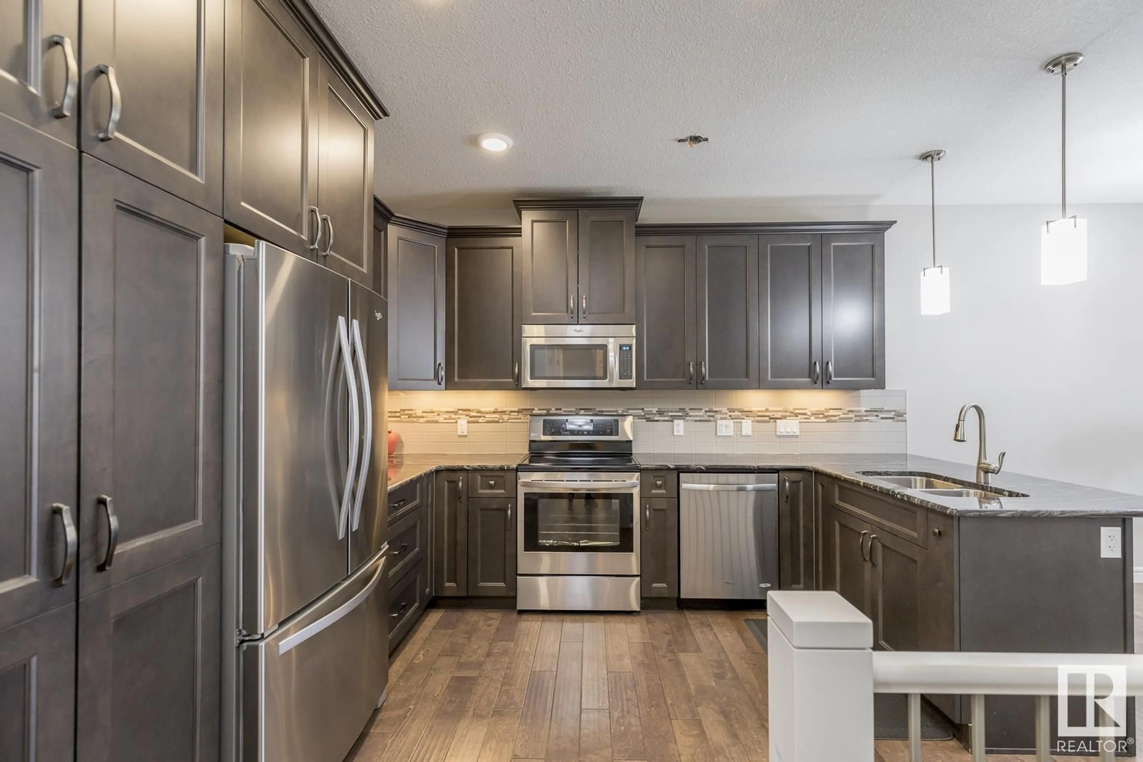 Contemporary kitchen for #2 7115 ARMOUR LI SW, Edmonton Alberta T6W2V2