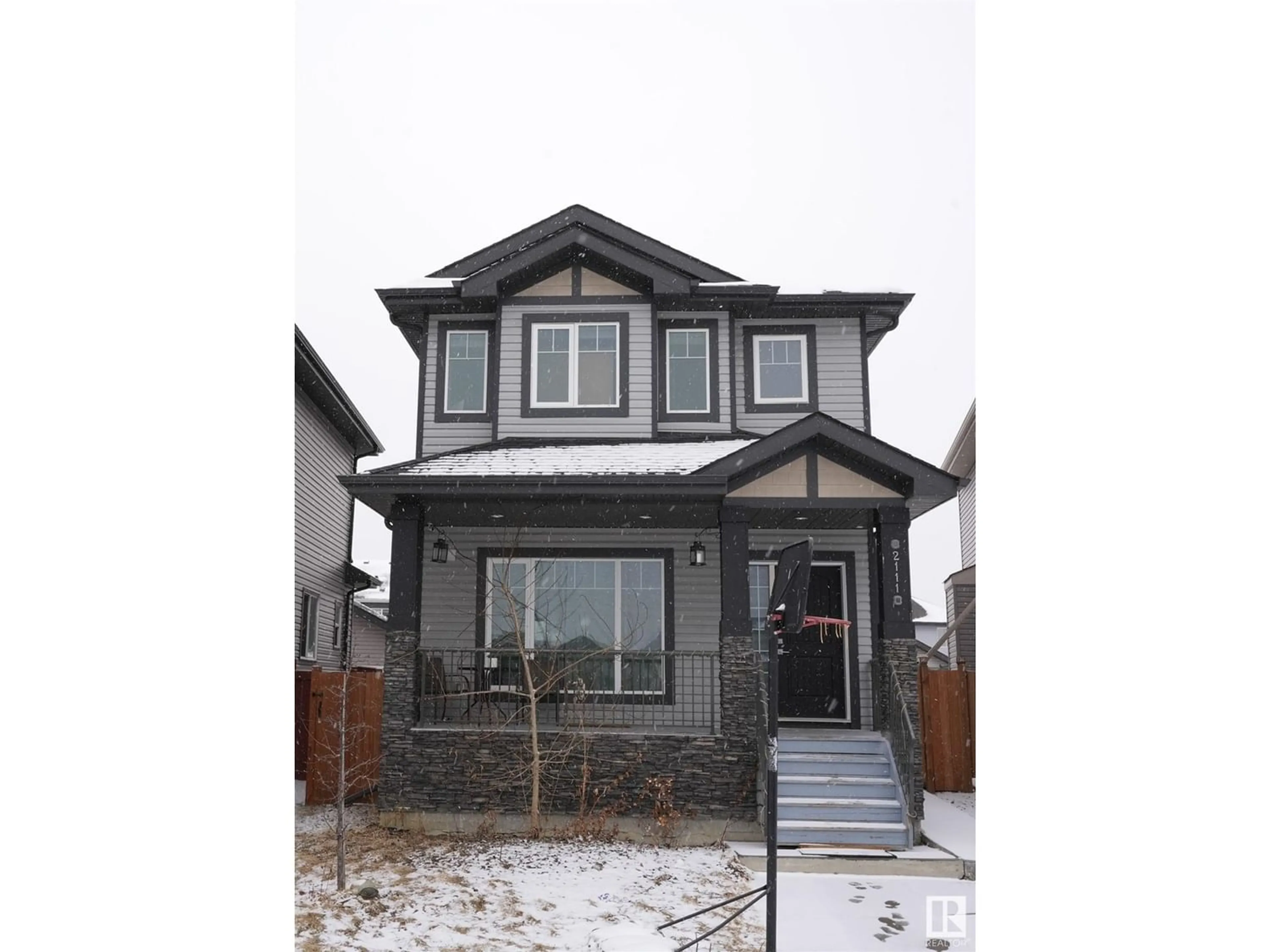 Frontside or backside of a home for 2111 26 ST NW, Edmonton Alberta T6T0Y6