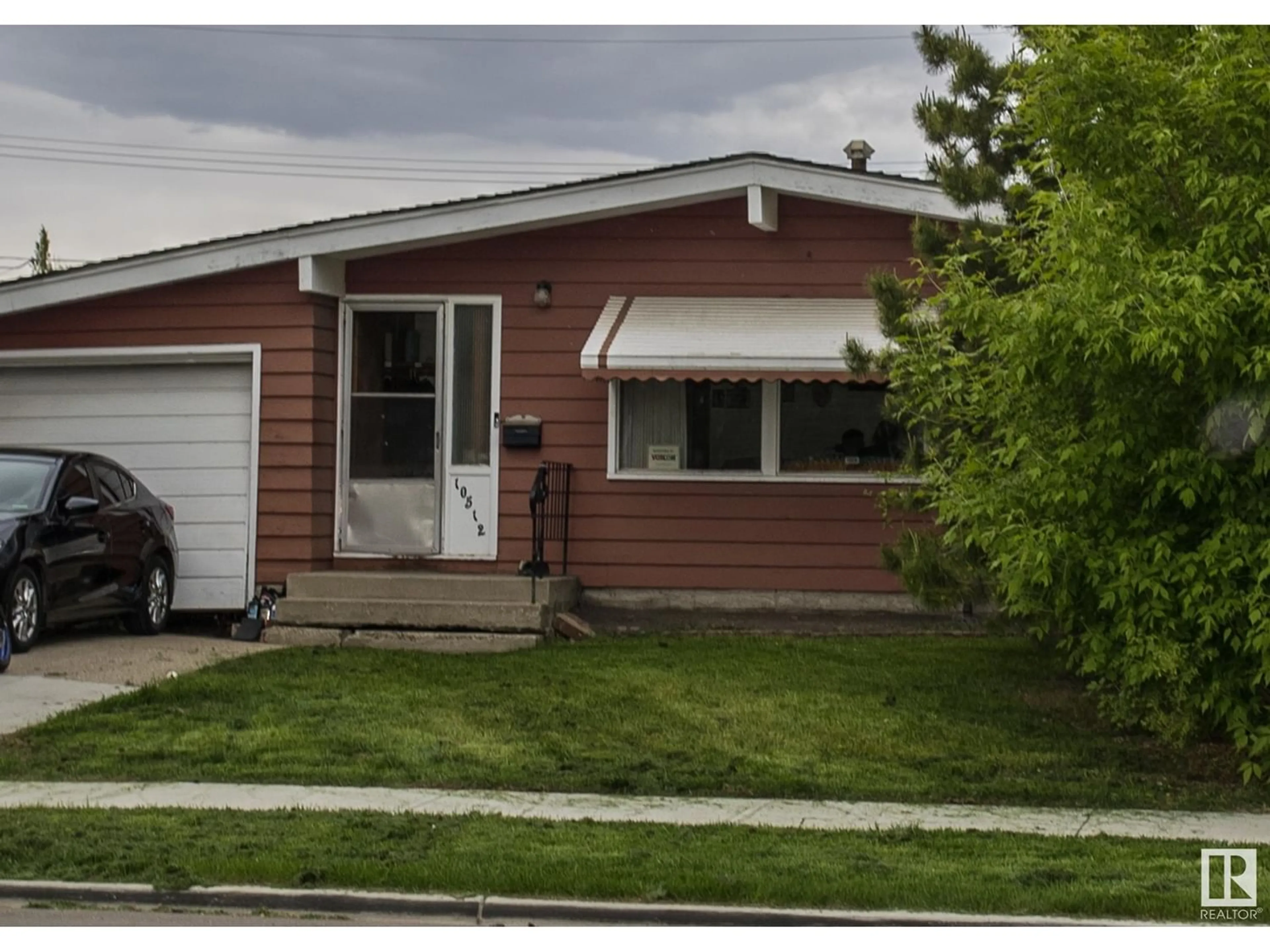 Frontside or backside of a home for 10512 55 AV NW, Edmonton Alberta T6H0W7