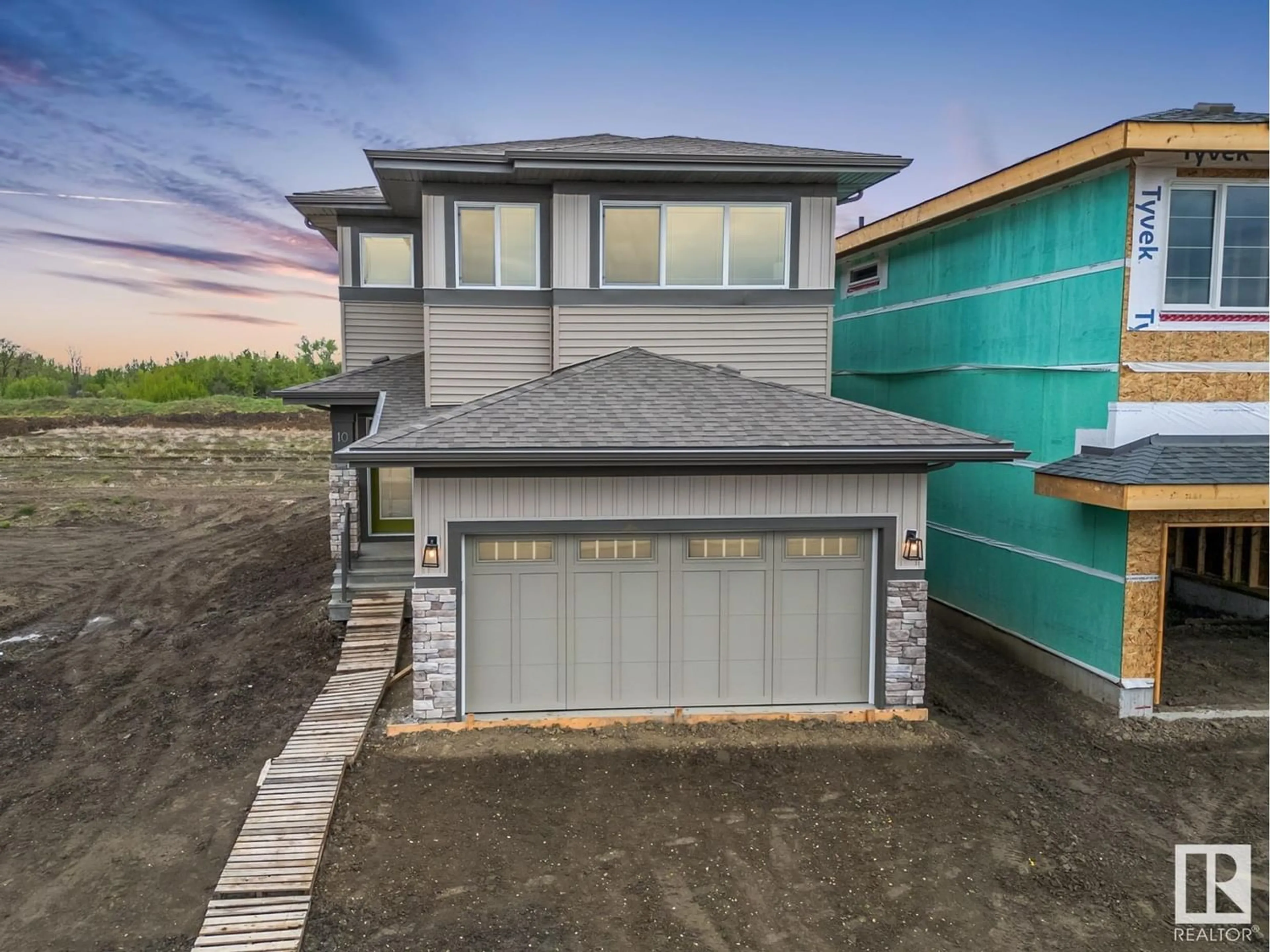 Frontside or backside of a home for 10 Eton LI, Spruce Grove Alberta T7X0Y9