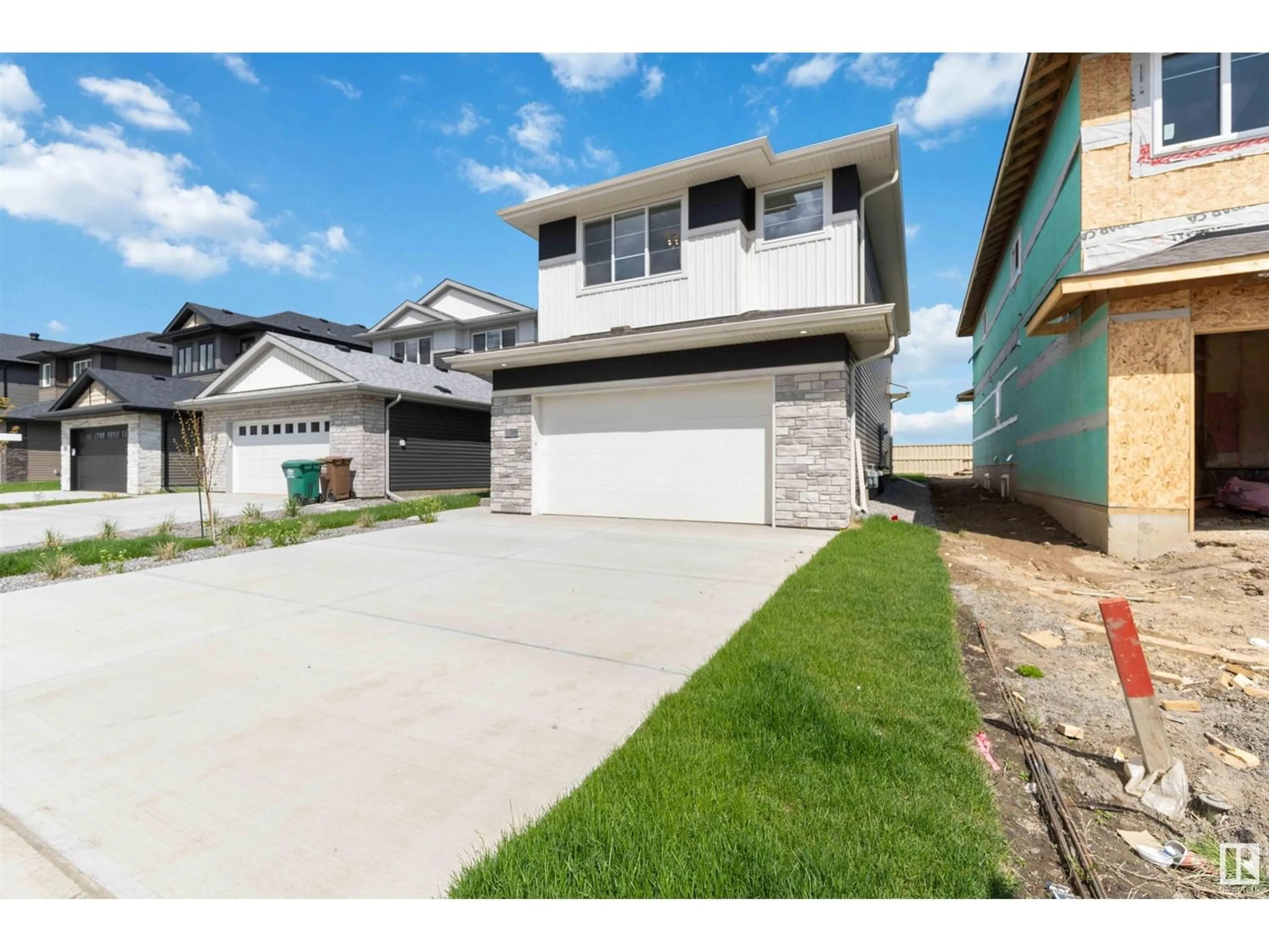 Frontside or backside of a home, the fenced backyard for 36 Maple CR, Gibbons Alberta T0A1N0