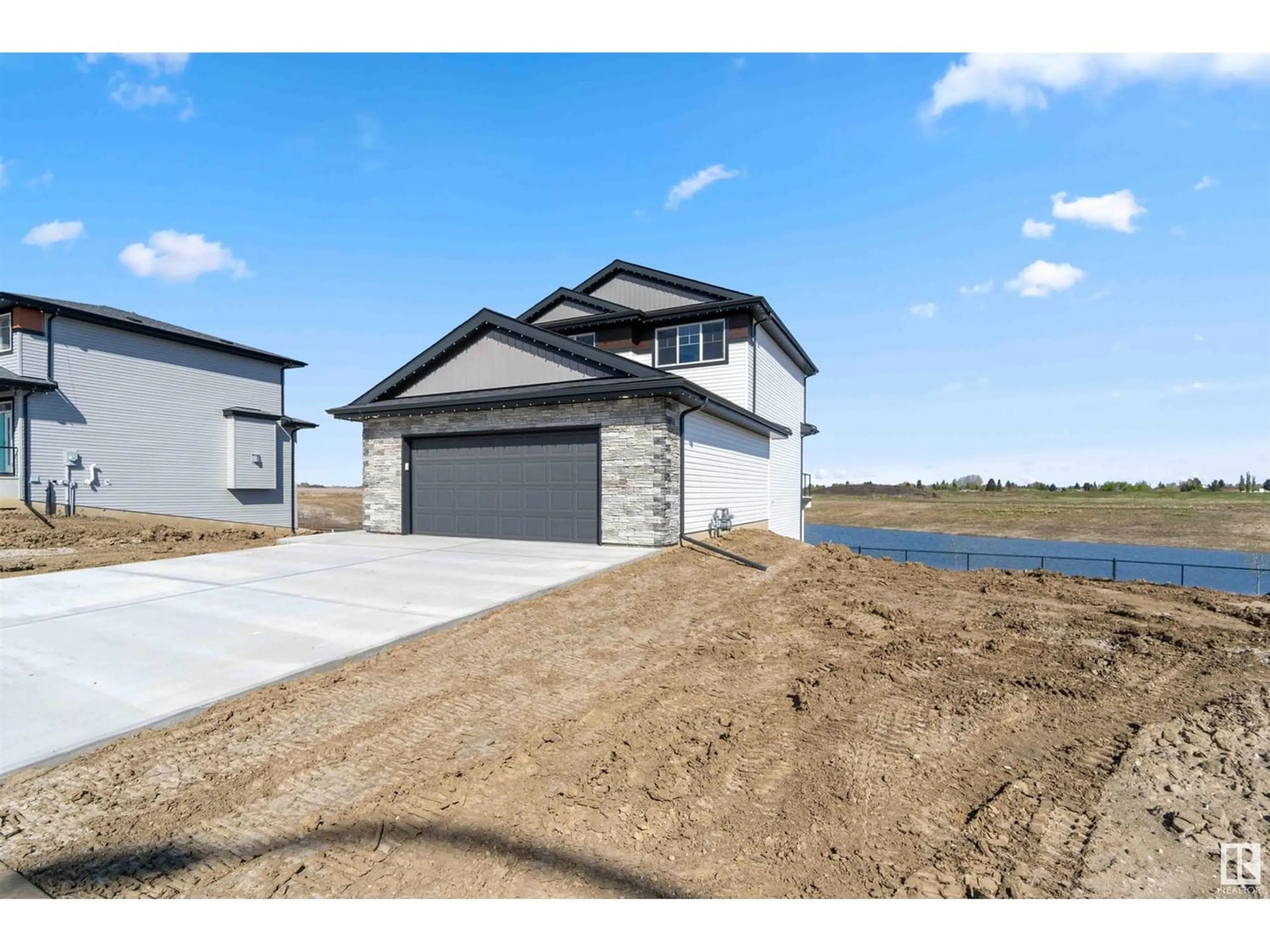 Frontside or backside of a home, the street view for 72 Maple CR, Gibbons Alberta T0A1N0