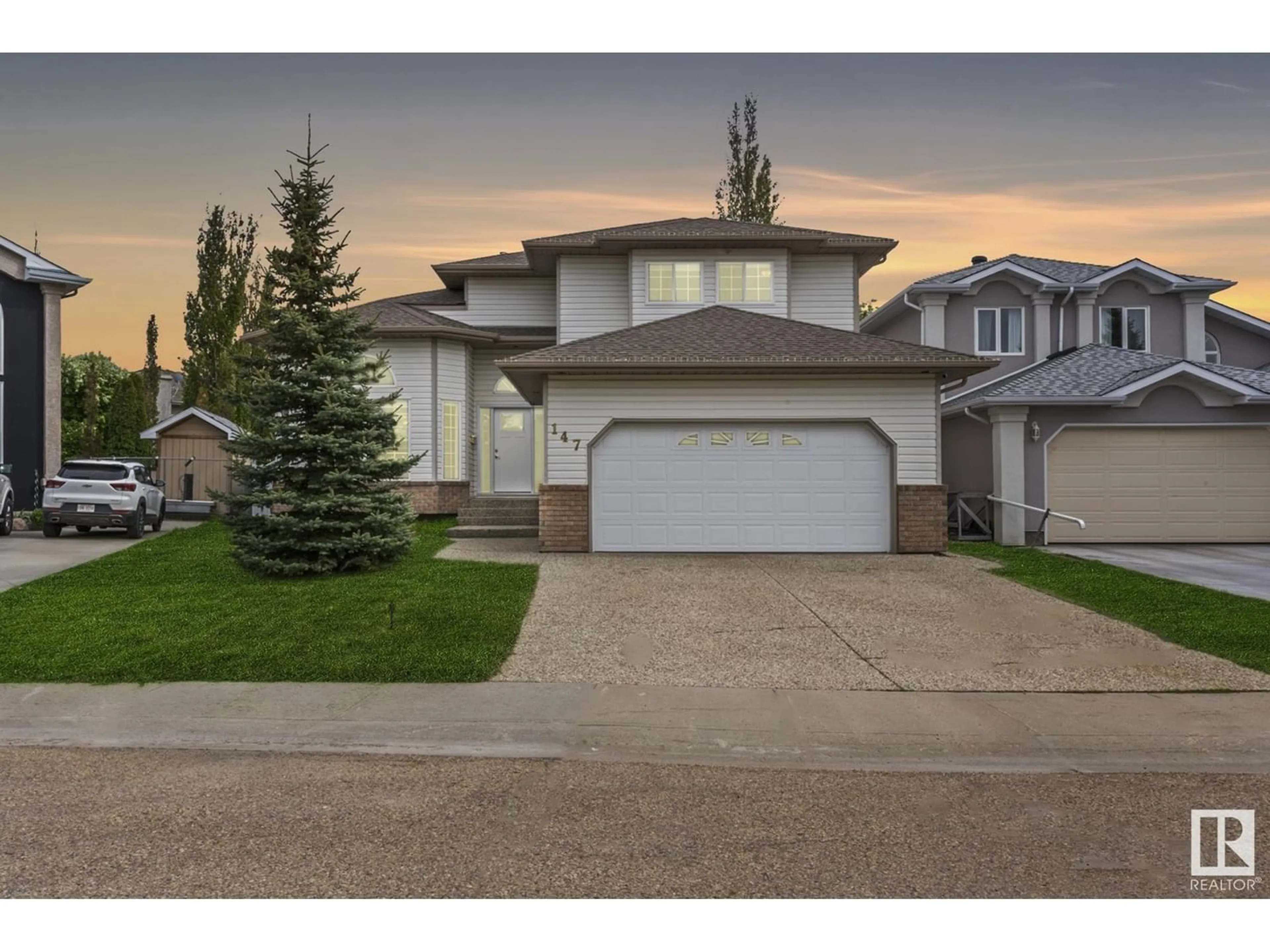 Frontside or backside of a home for 147 KULAWY DR N NW, Edmonton Alberta T2L6T9