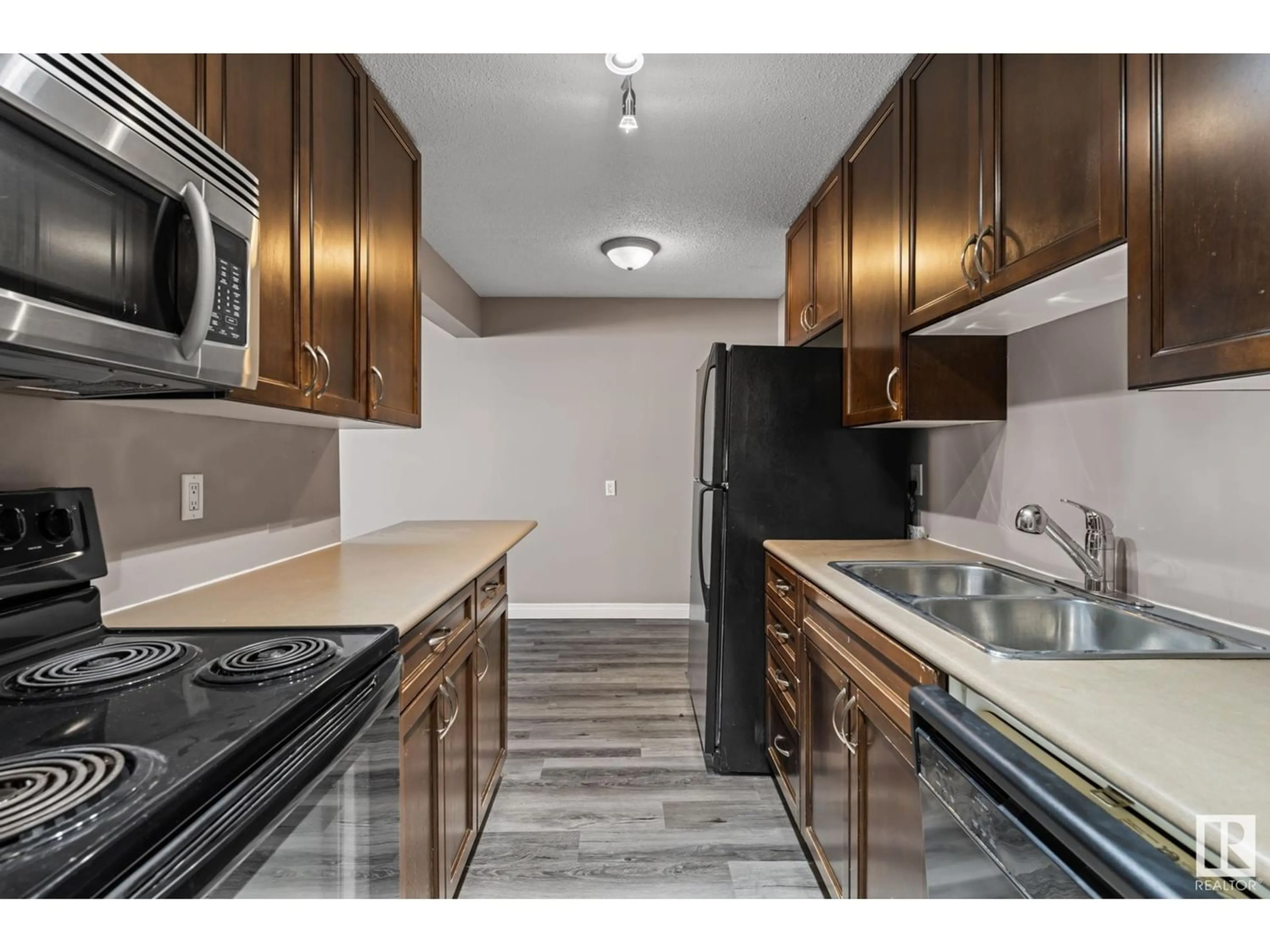 Standard kitchen for #104 10415 93 ST NW NW, Edmonton Alberta T5H1X5