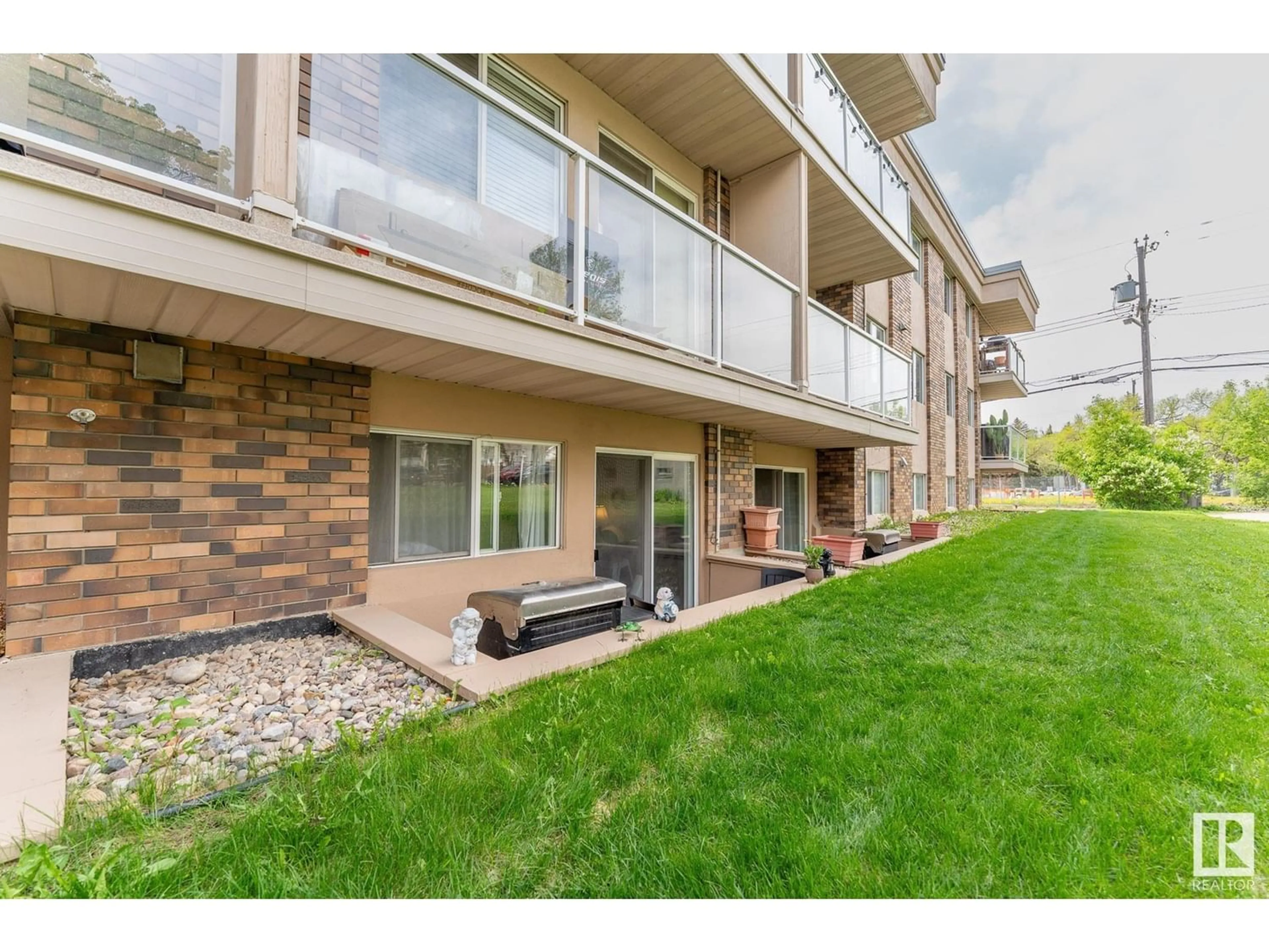 A pic from exterior of the house or condo for #105 10230 120 ST NW NW, Edmonton Alberta T5K2A3