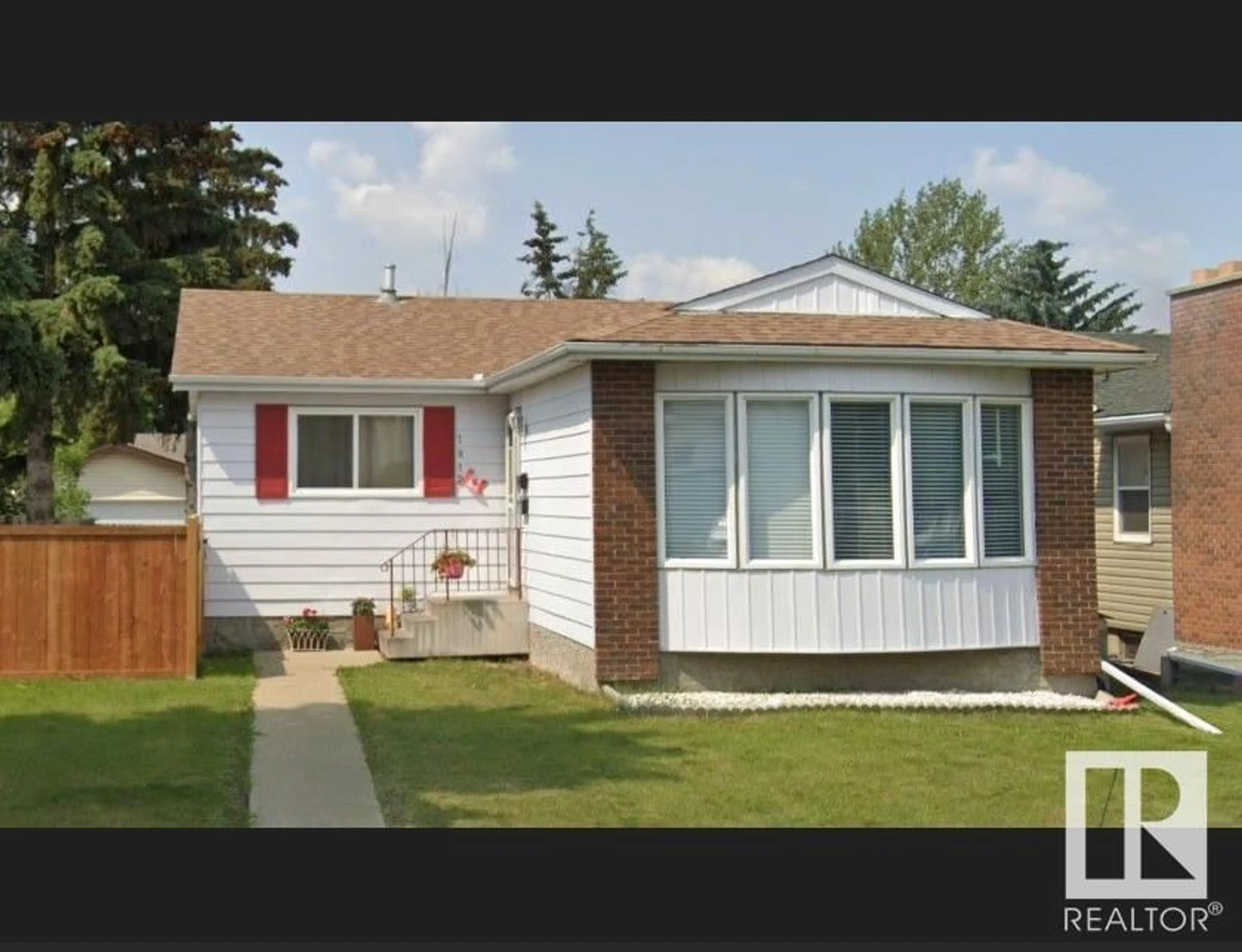 Frontside or backside of a home for 1812 36 ST NW, Edmonton Alberta T6L3G5