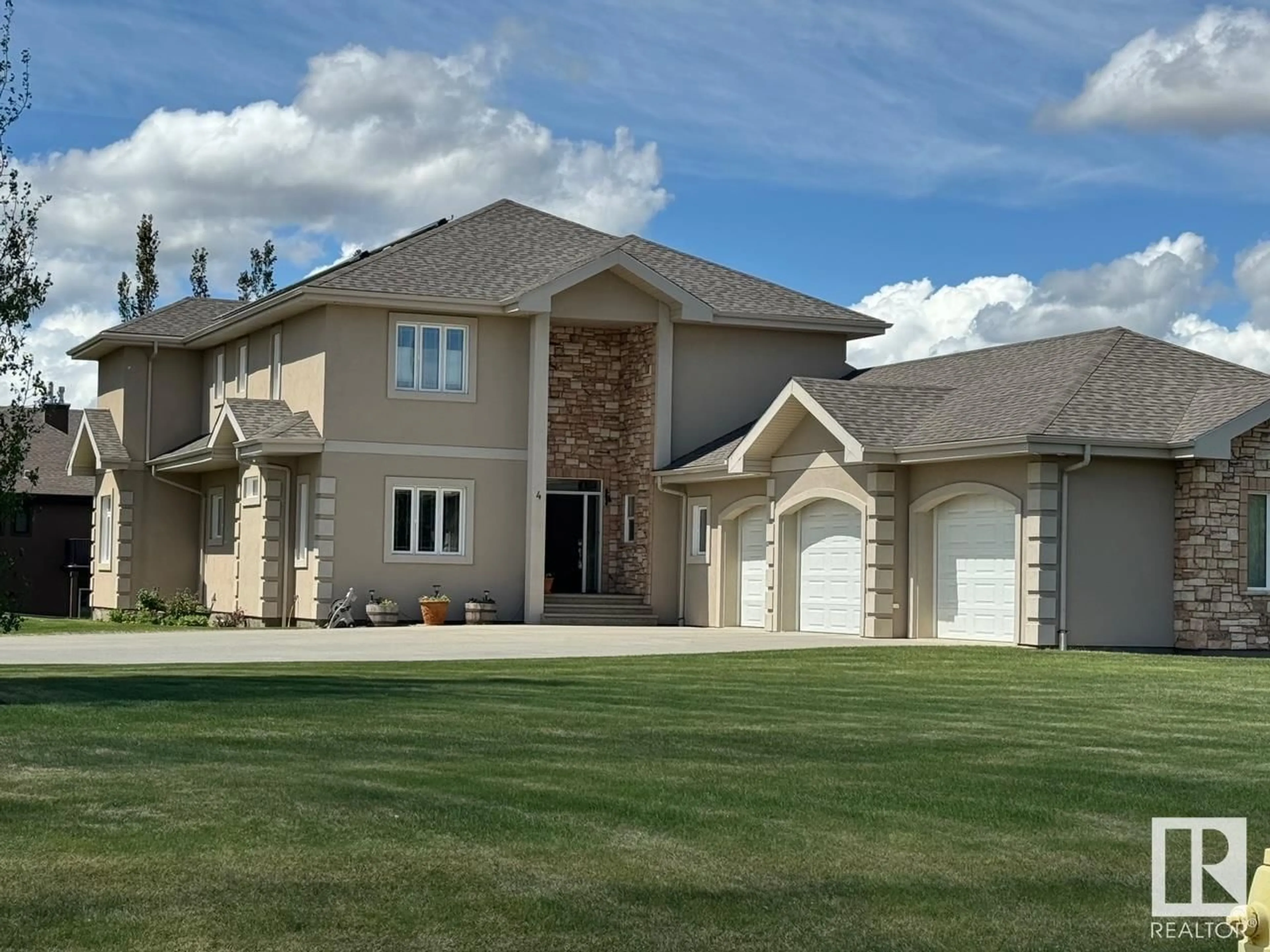 Frontside or backside of a home for 4 26126 HWY 16, Rural Parkland County Alberta T7Y1A1