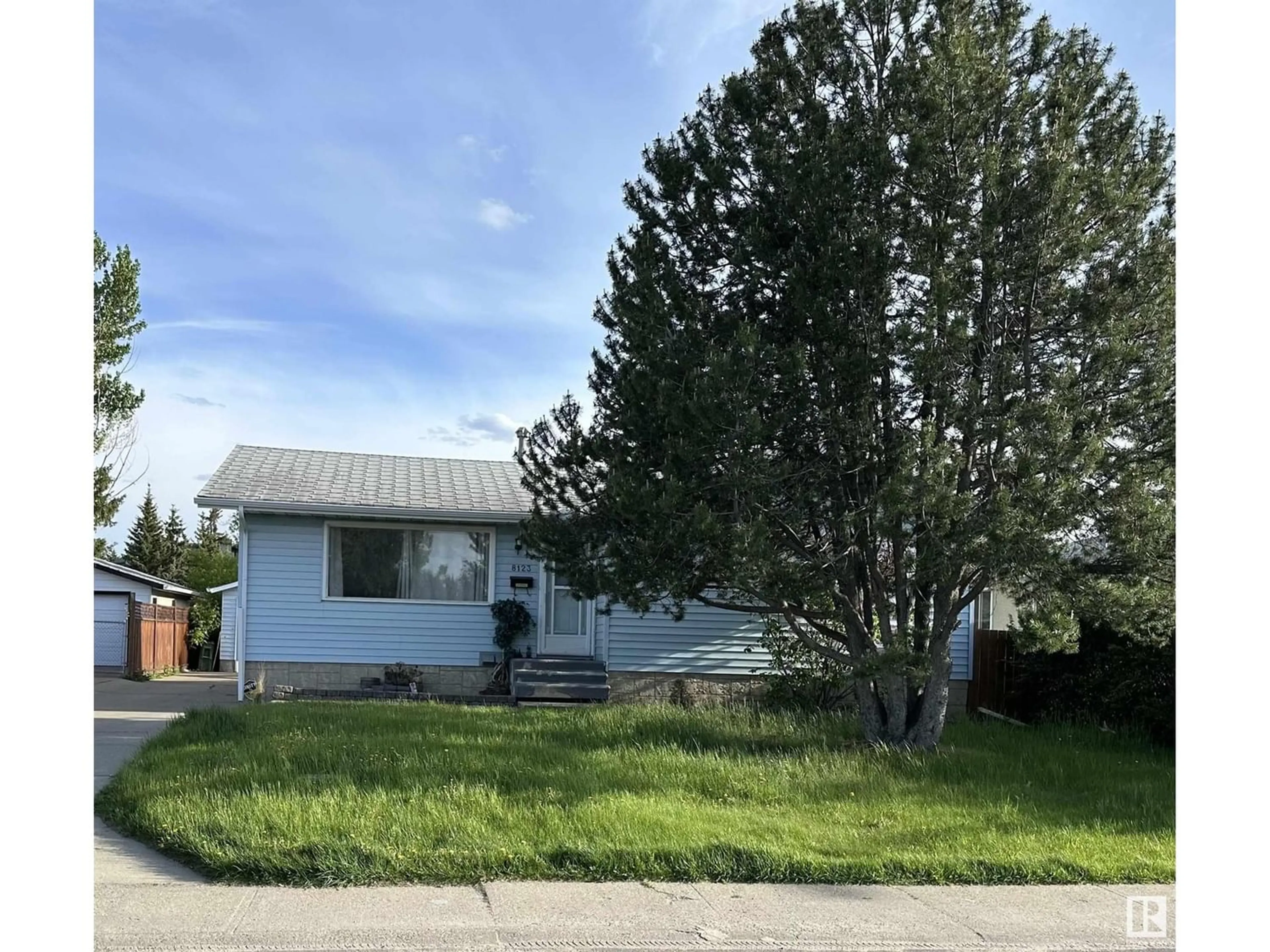 Frontside or backside of a home for 8123 34A AV NW, Edmonton Alberta T6K0B5