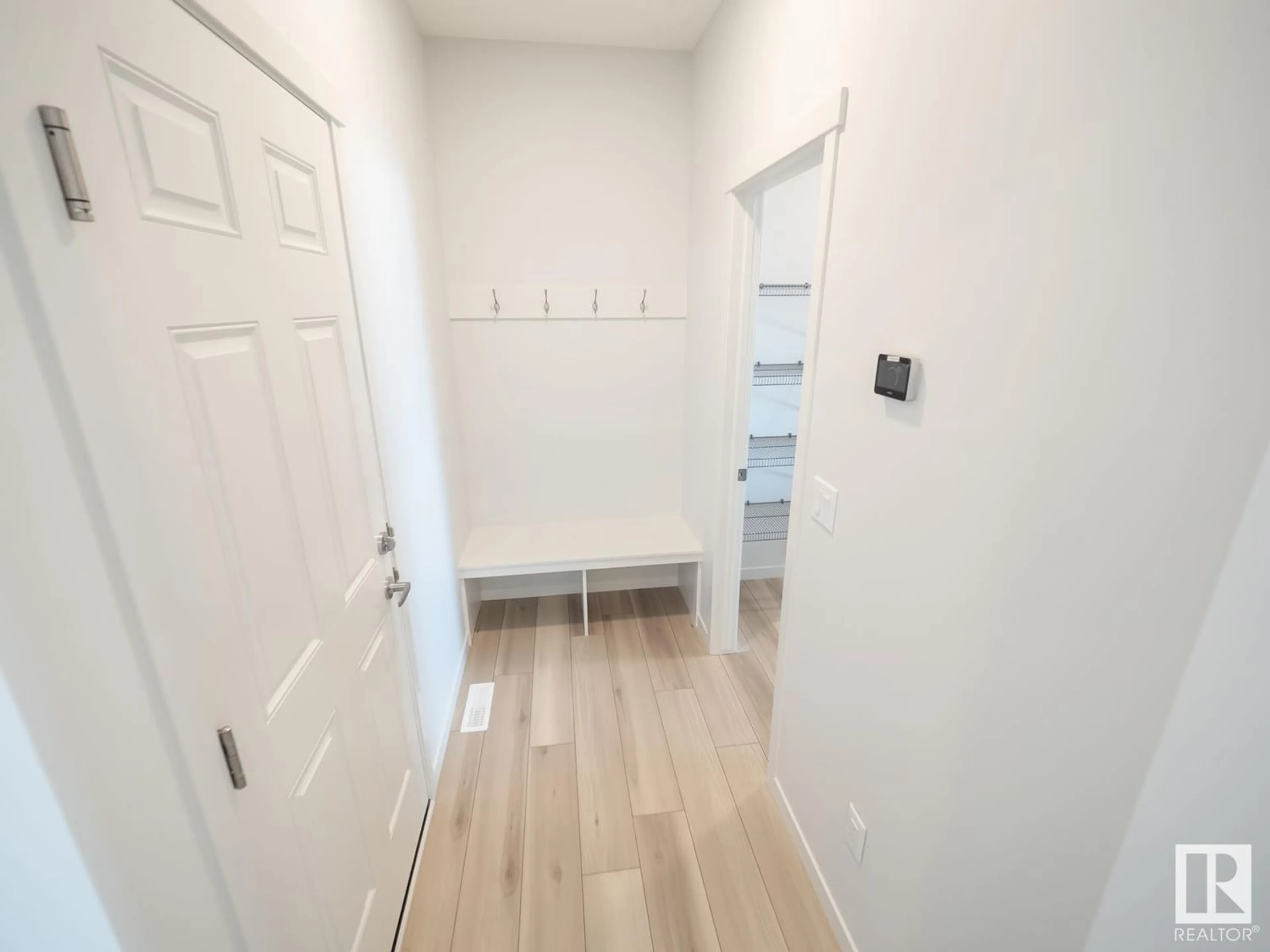 Indoor entryway for 2416 208 ST NW, Edmonton Alberta T6M2J7