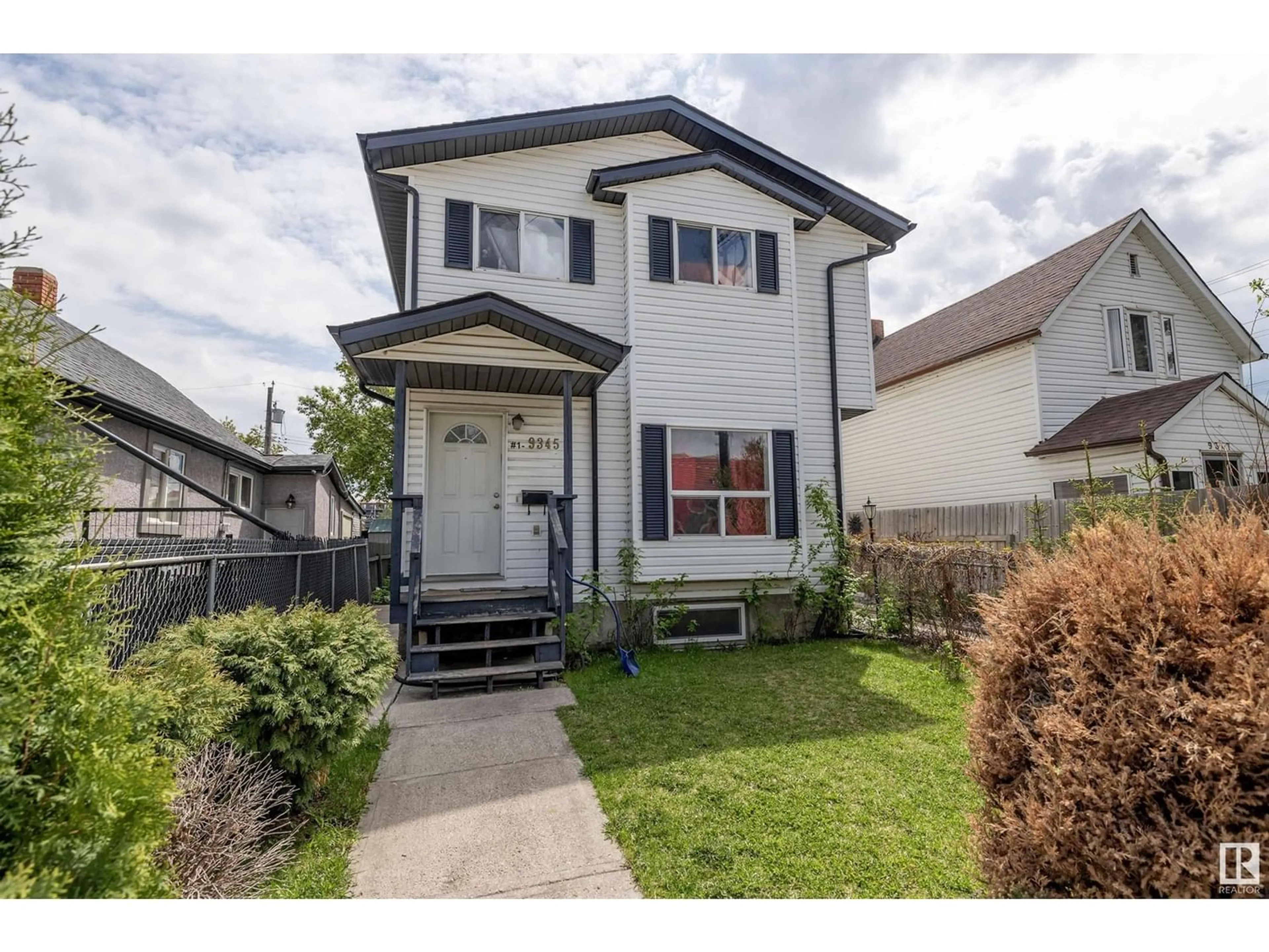 Frontside or backside of a home for #1 9345 106A AV NW, Edmonton Alberta T5H0S6