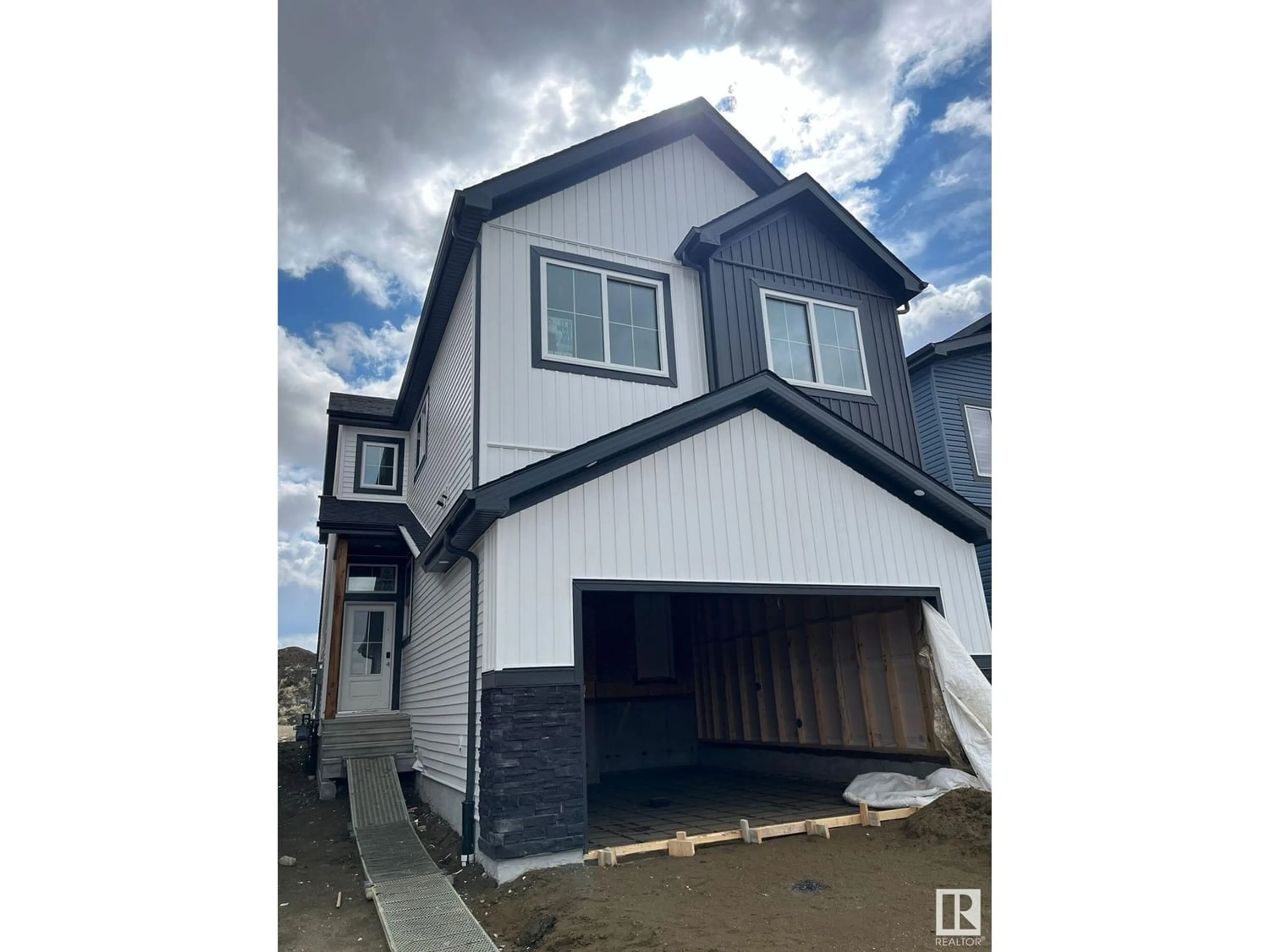 Frontside or backside of a home for 6421 66 ST, Beaumont Alberta T4X2P6