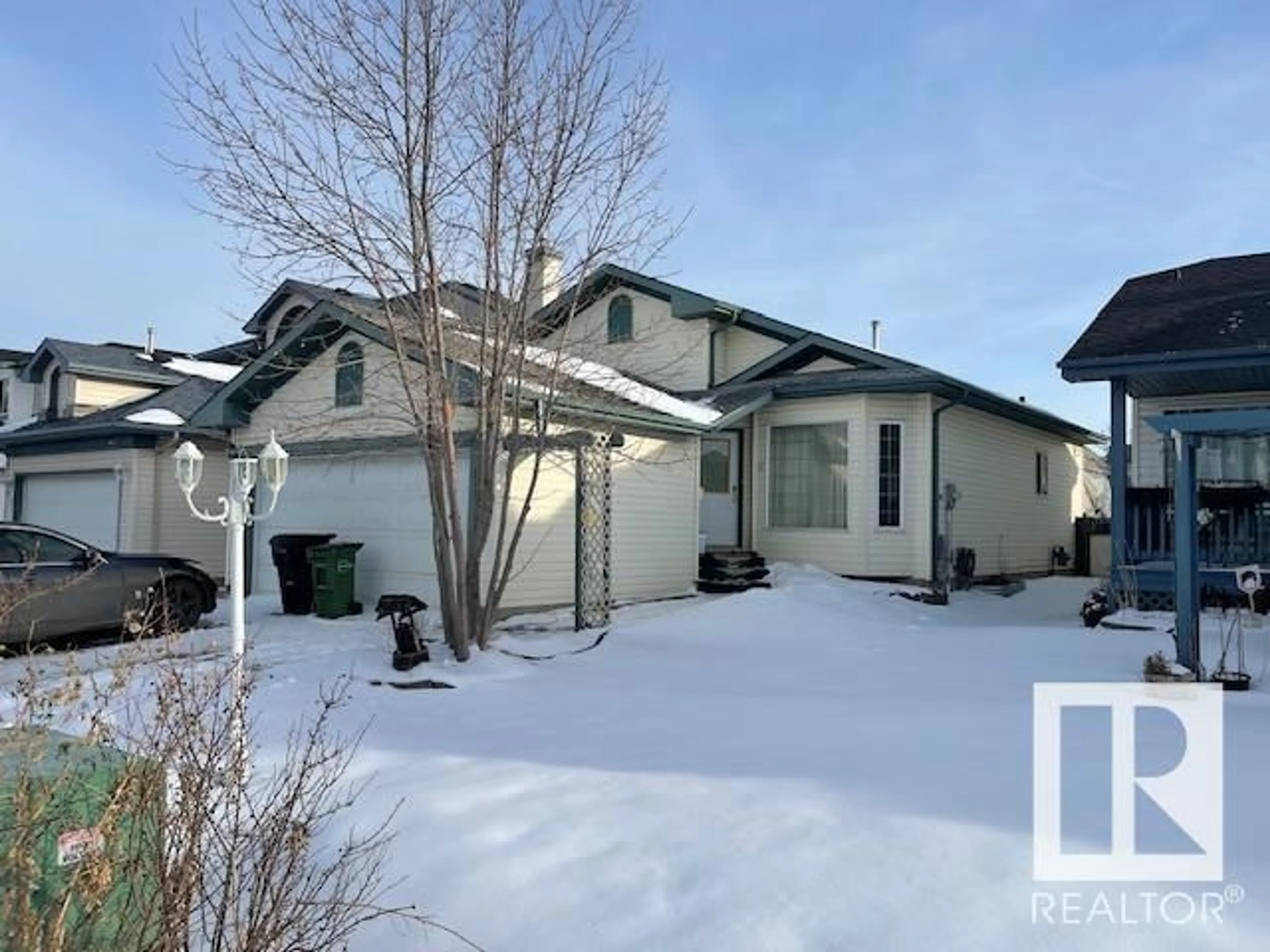 Frontside or backside of a home for 215 WYMAN LN NW, Edmonton Alberta T6T1M9