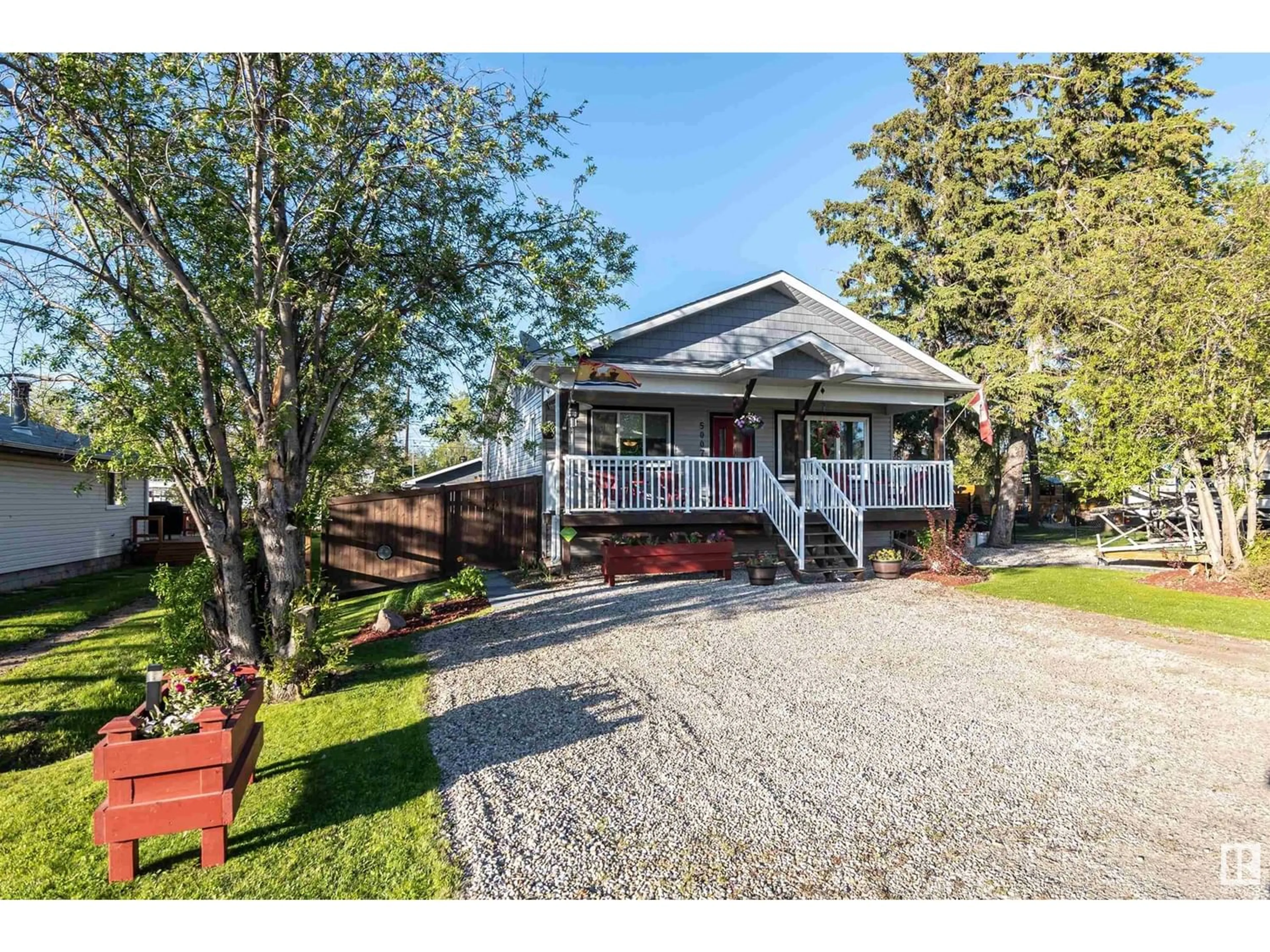 Frontside or backside of a home for 5007 57 ST, Rural Lac Ste. Anne County Alberta T0E0A0