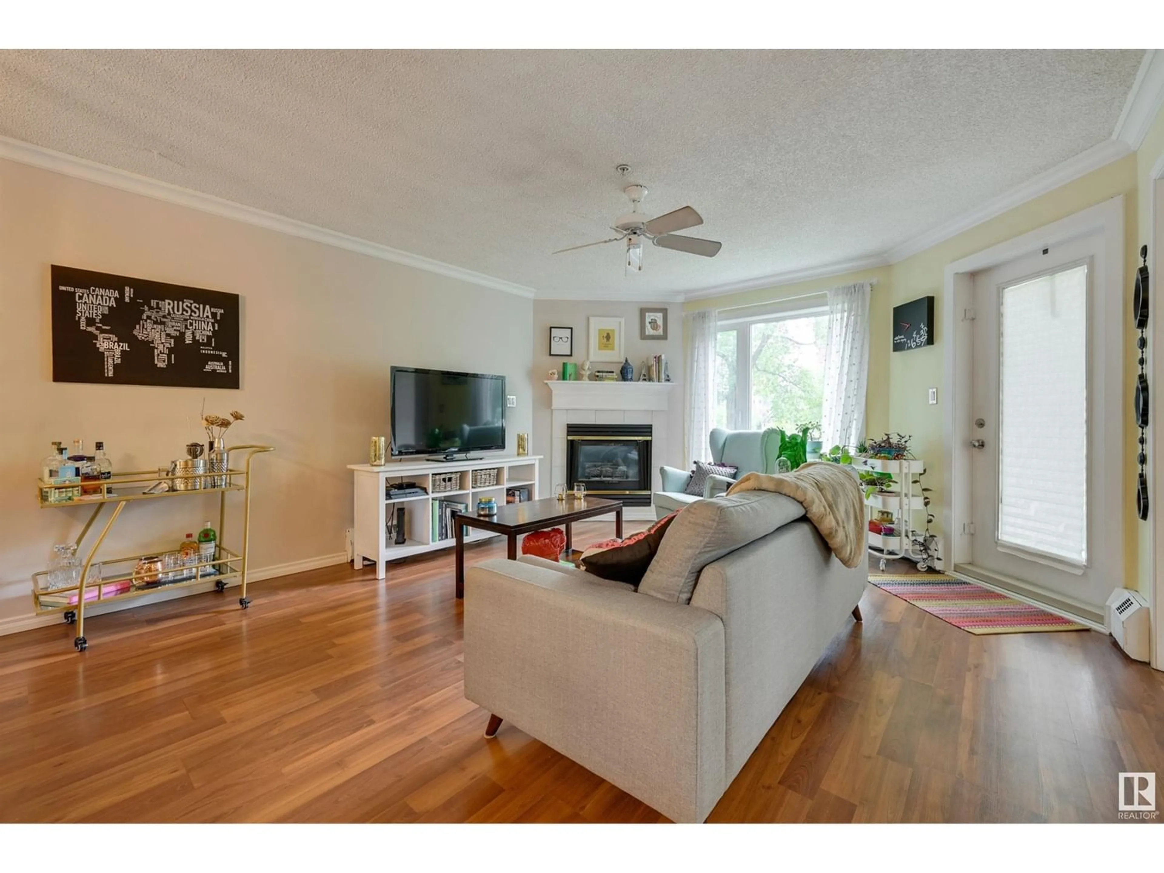 Living room for #104 9905 112 ST NW, Edmonton Alberta T5K1L6