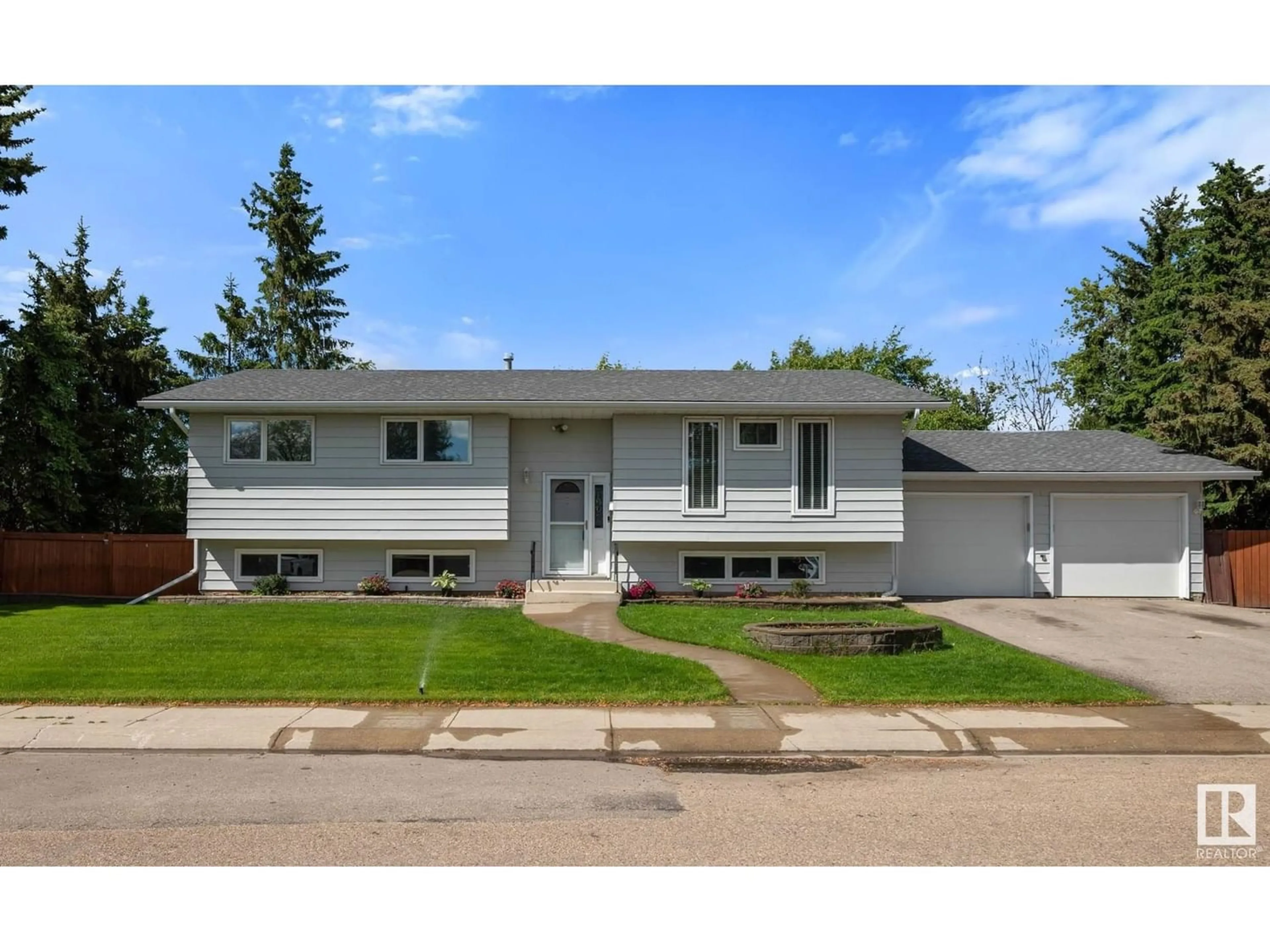 Frontside or backside of a home for 18616 92 AV NW, Edmonton Alberta T5T1S5