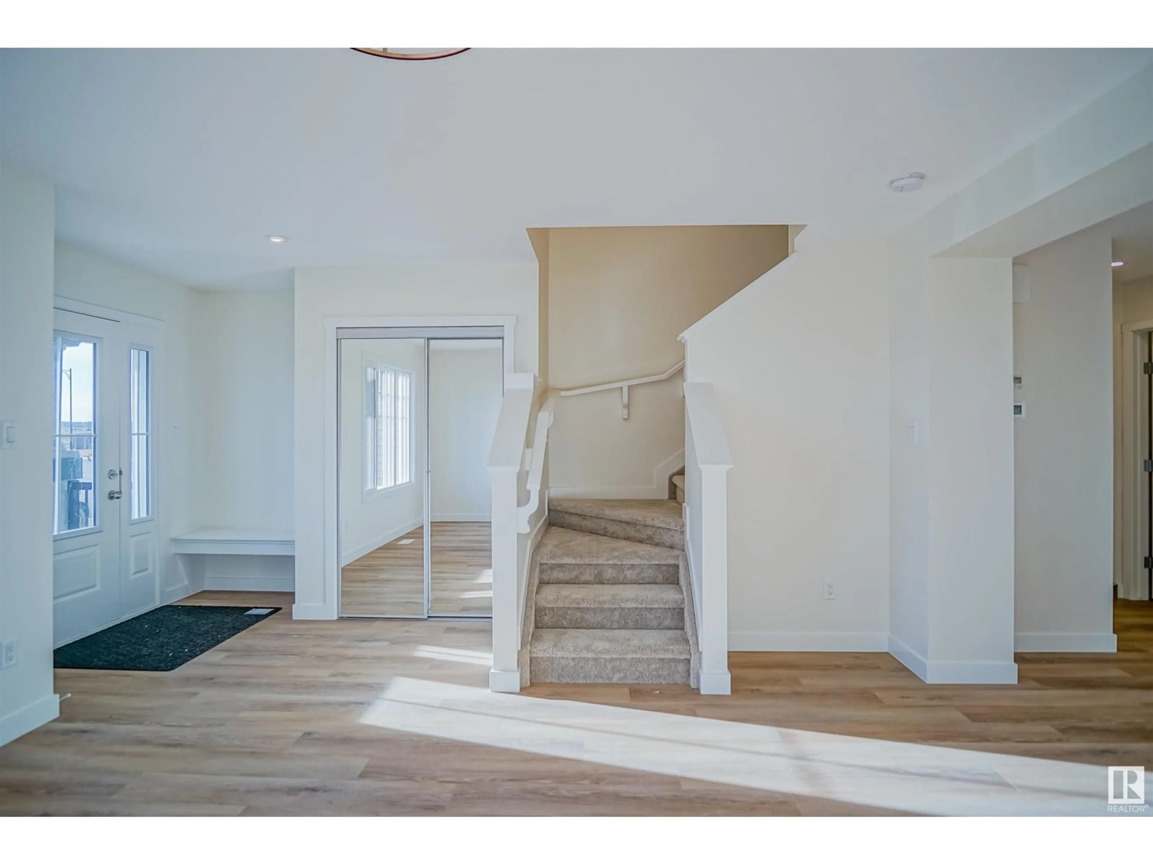 Indoor foyer, wood floors for 1557 SANDSTONE BV, Sherwood Park Alberta T8L0Z4