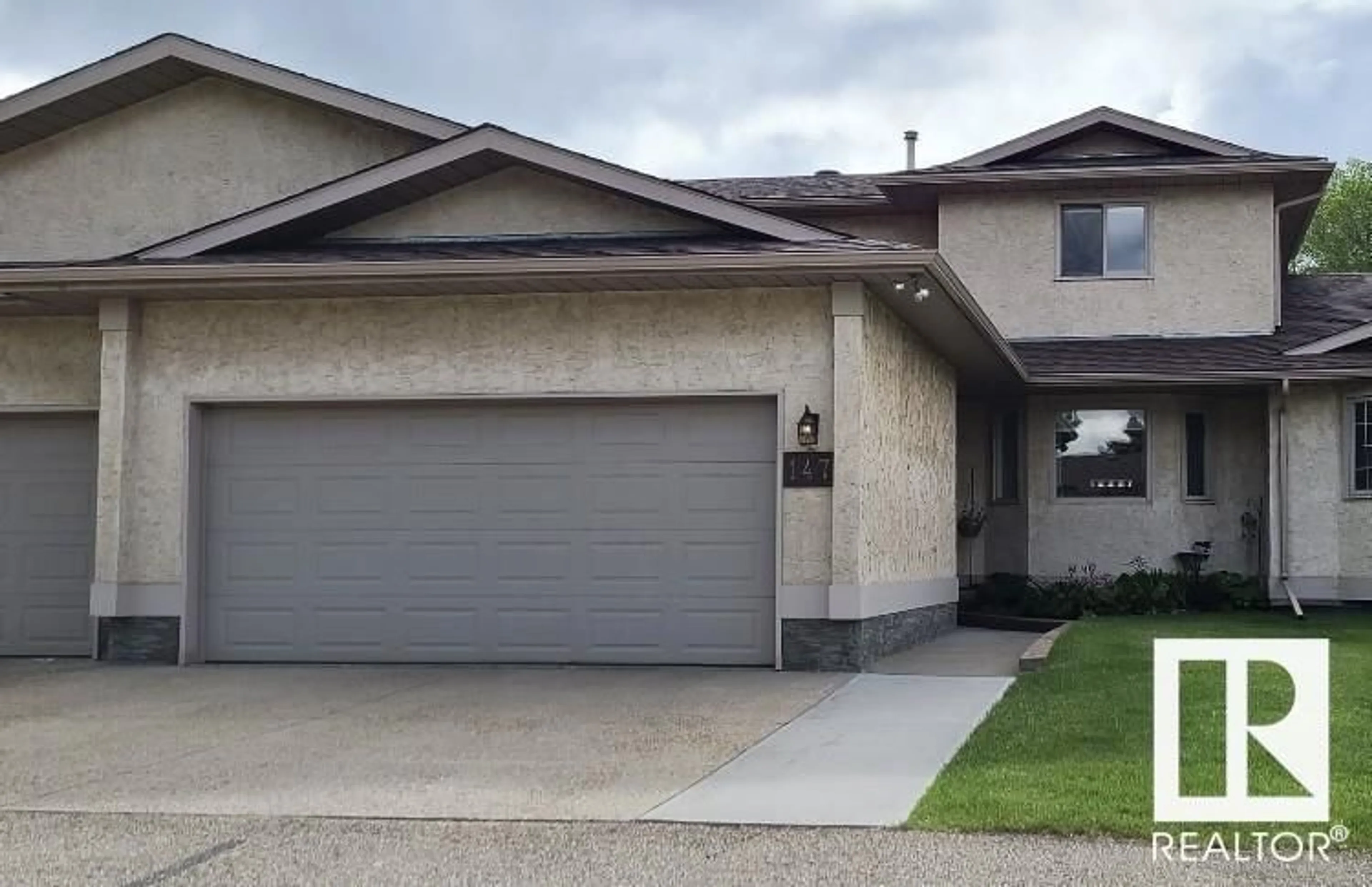 Frontside or backside of a home for 147 KNOTTWOOD RD N NW, Edmonton Alberta T6K4B8