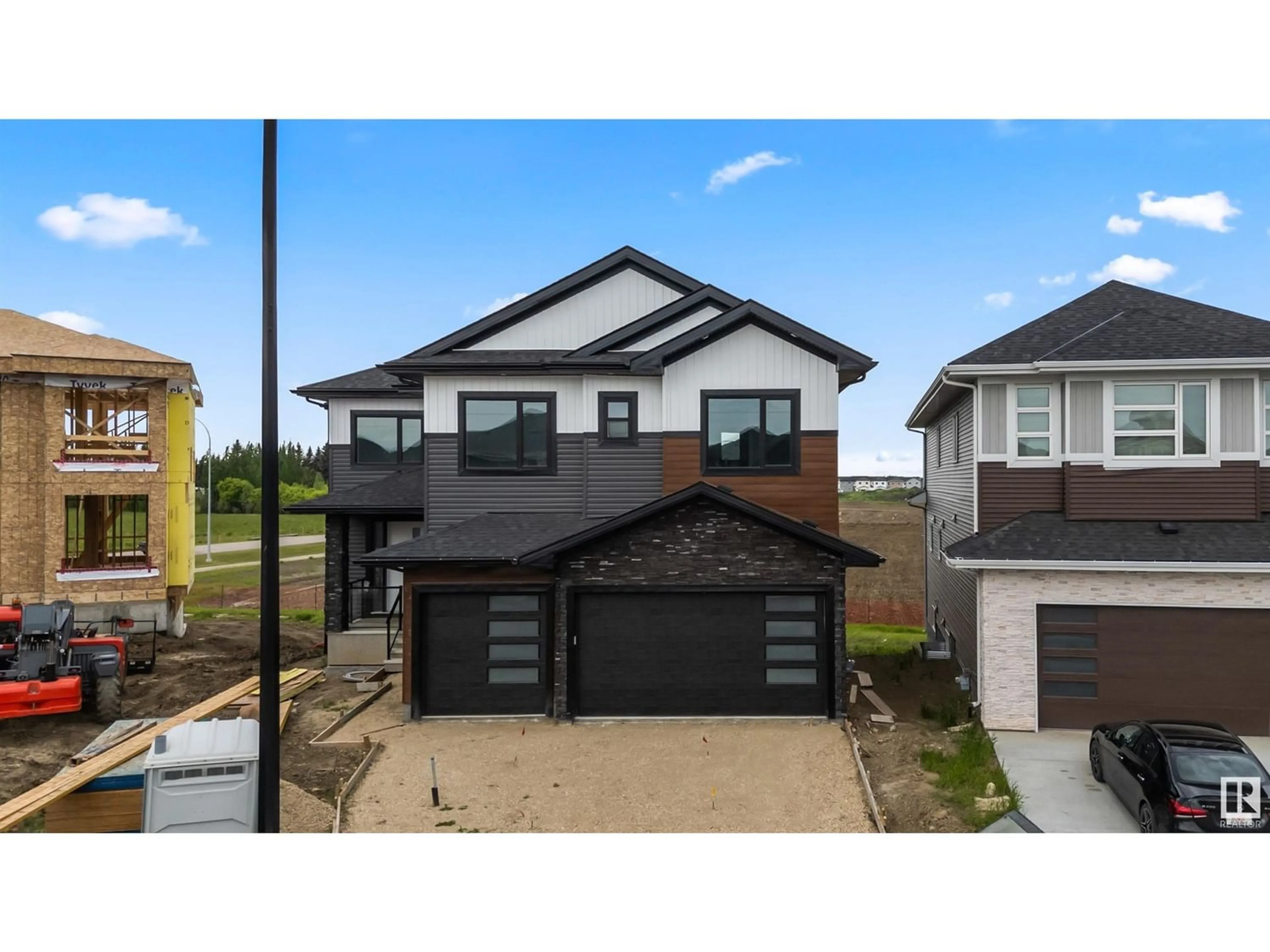 Frontside or backside of a home for 6614 39 AV, Beaumont Alberta T4X0G7