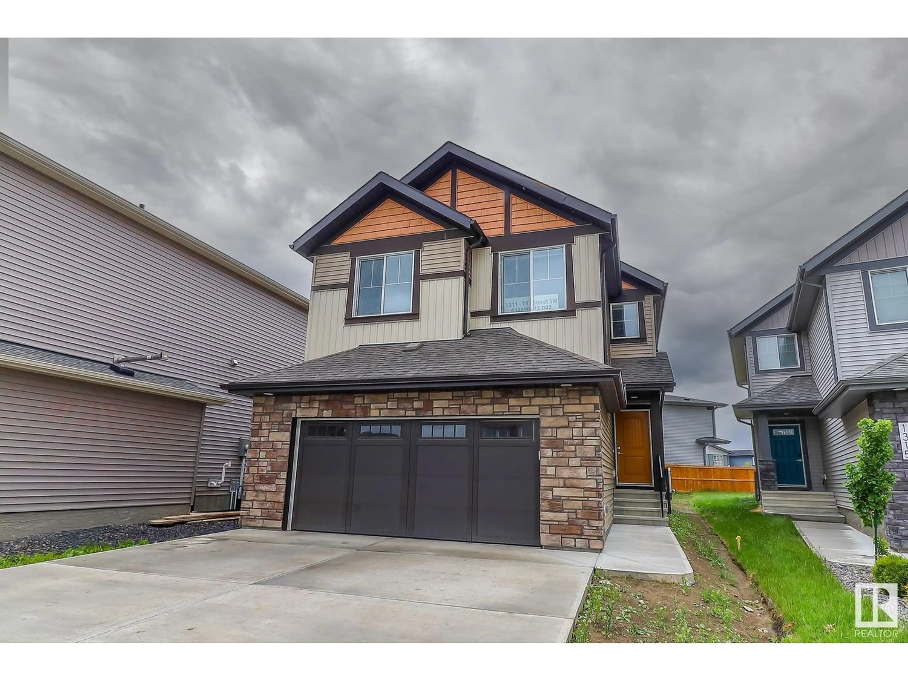 Frontside or backside of a home for 1311 157 ST SW, Edmonton Alberta T6W4K7