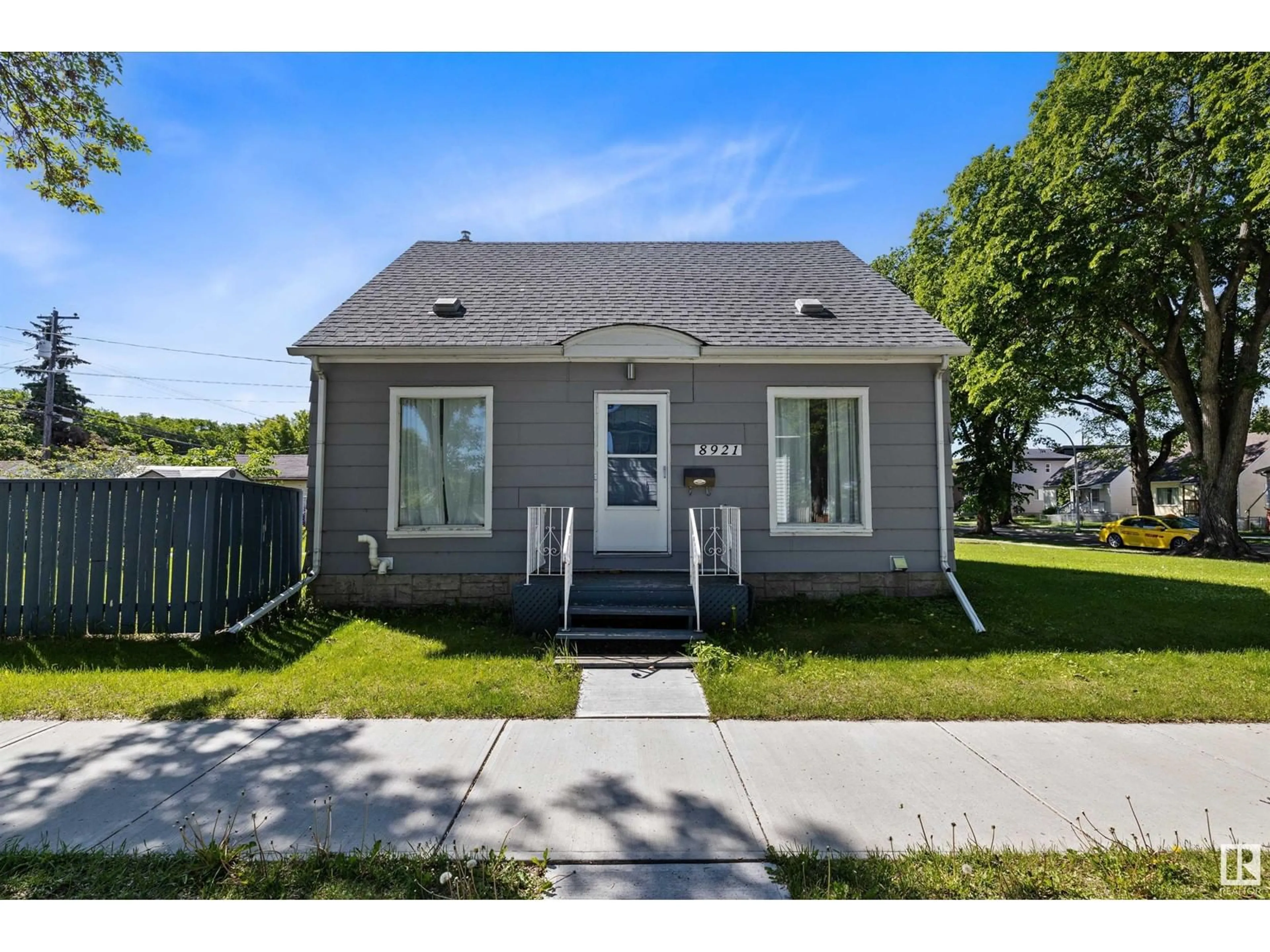 Frontside or backside of a home for 8921 114 AV NW, Edmonton Alberta T5B0K5