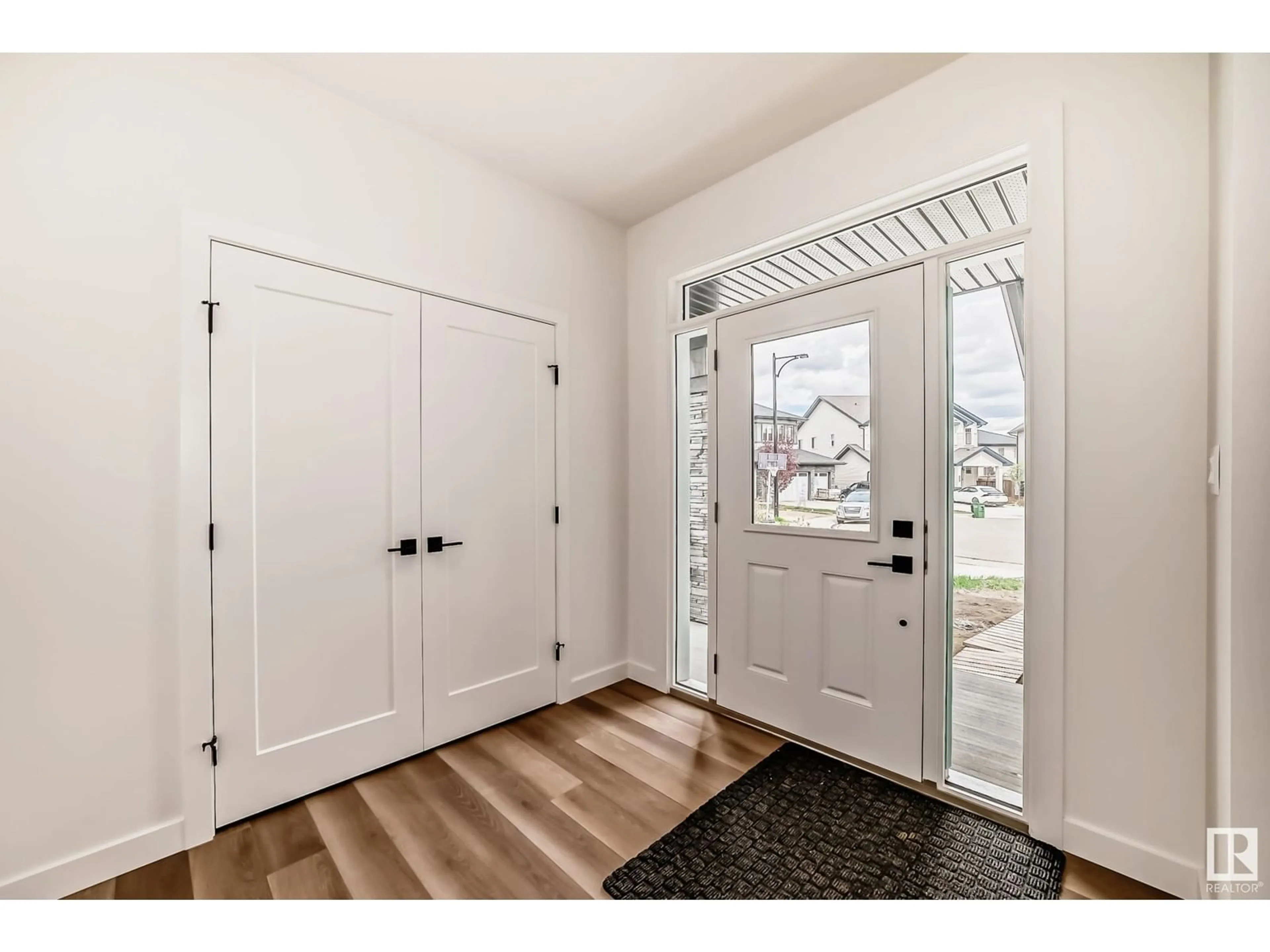 Indoor entryway, wood floors for 1512 AINSLIE PL SW, Edmonton Alberta T6W0H6