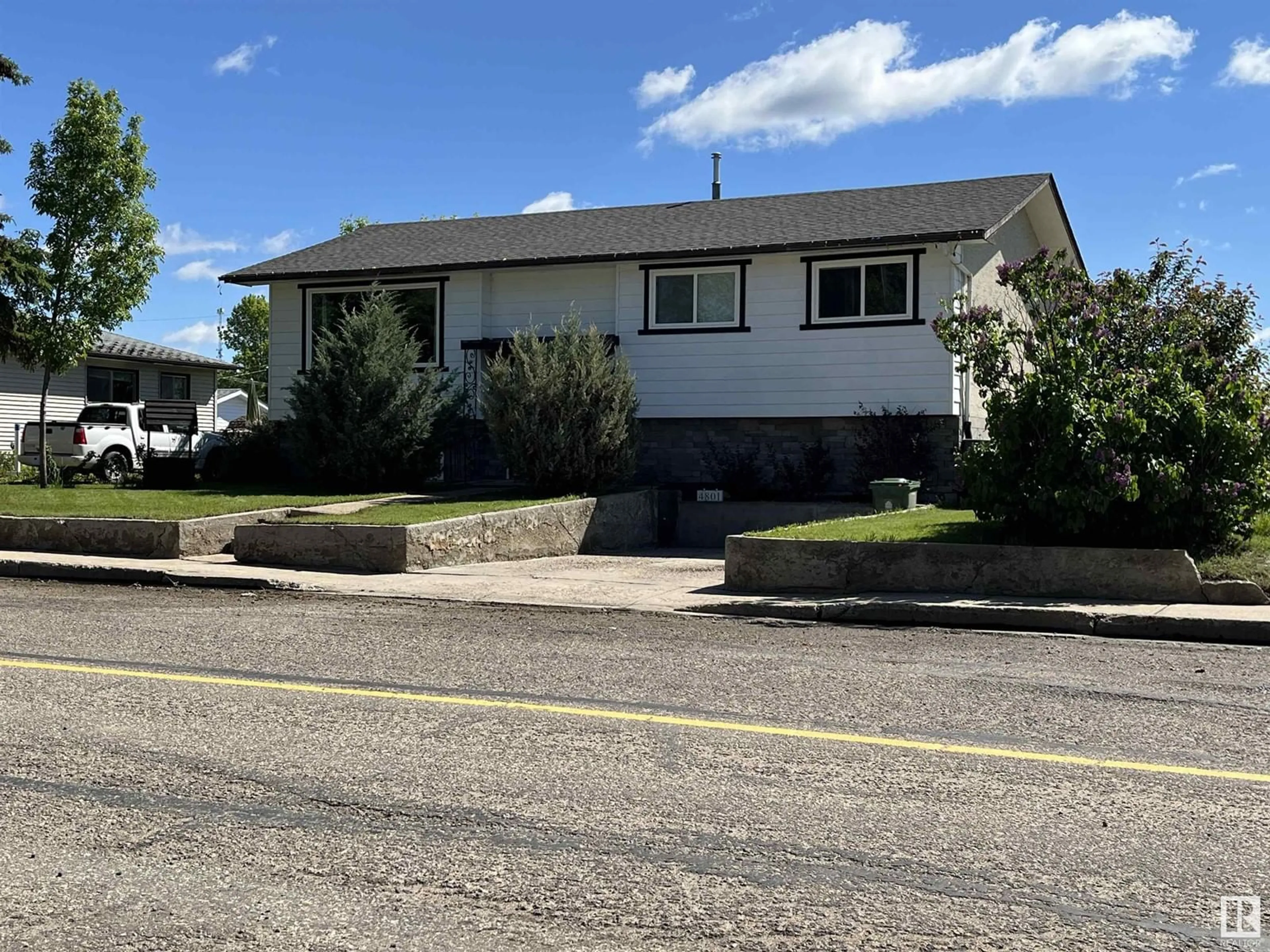 Frontside or backside of a home for 4801 53 ST, Bonnyville Town Alberta T9N1Y1