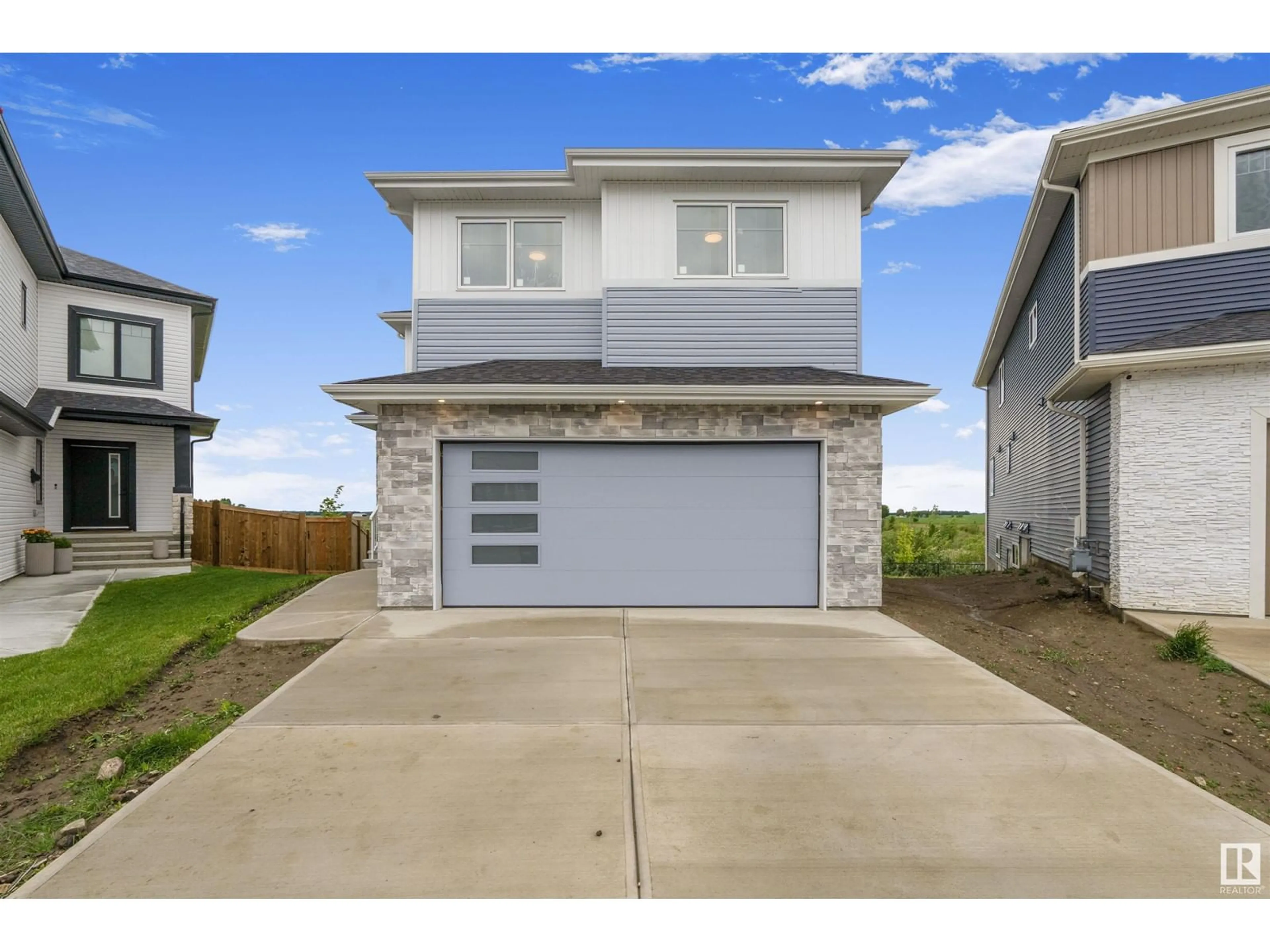 Frontside or backside of a home for 324 ASTON CL, Leduc Alberta T9E1H9