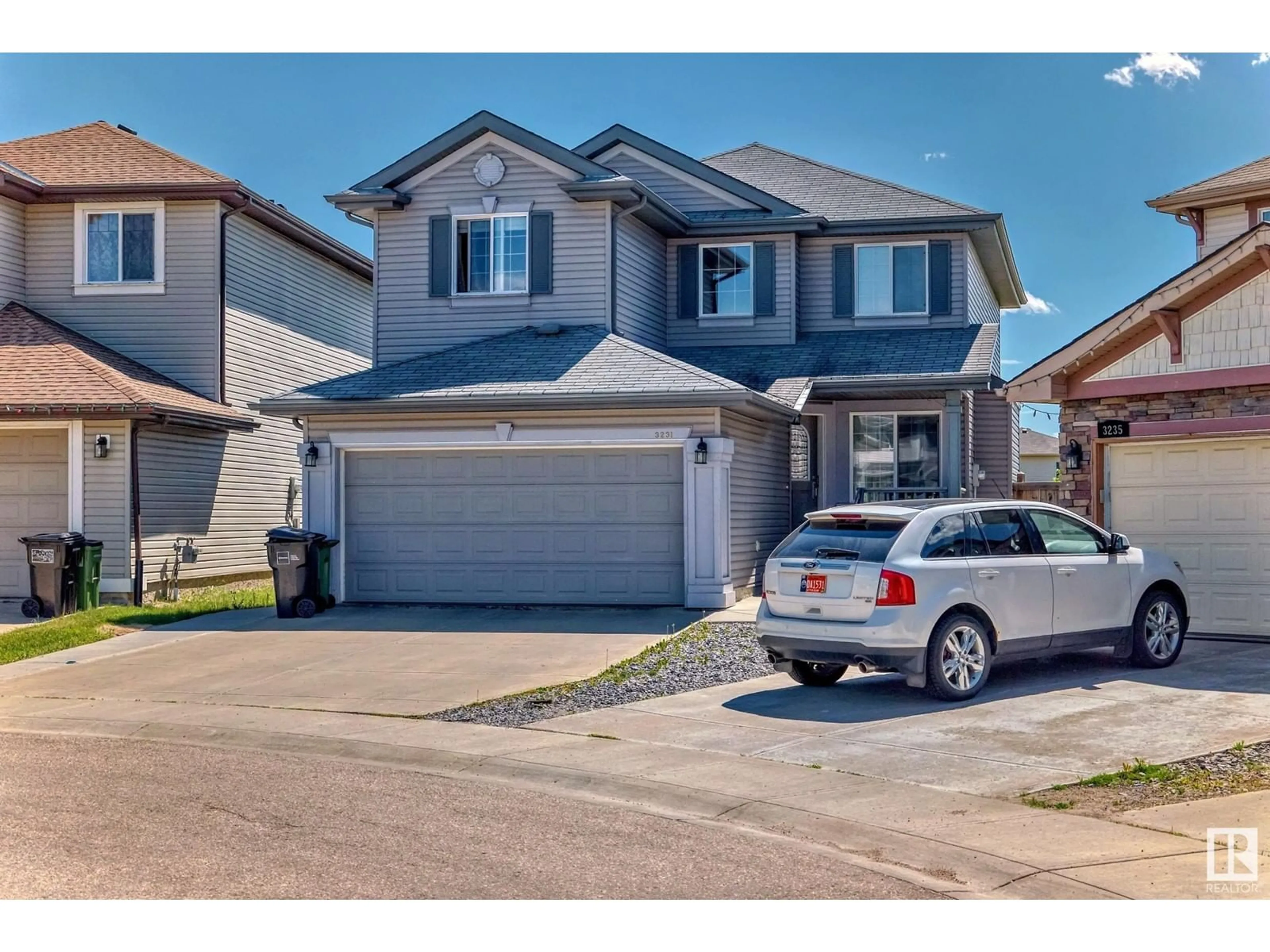 Frontside or backside of a home for 3231 24 AV NW, Edmonton Alberta T6T0C9