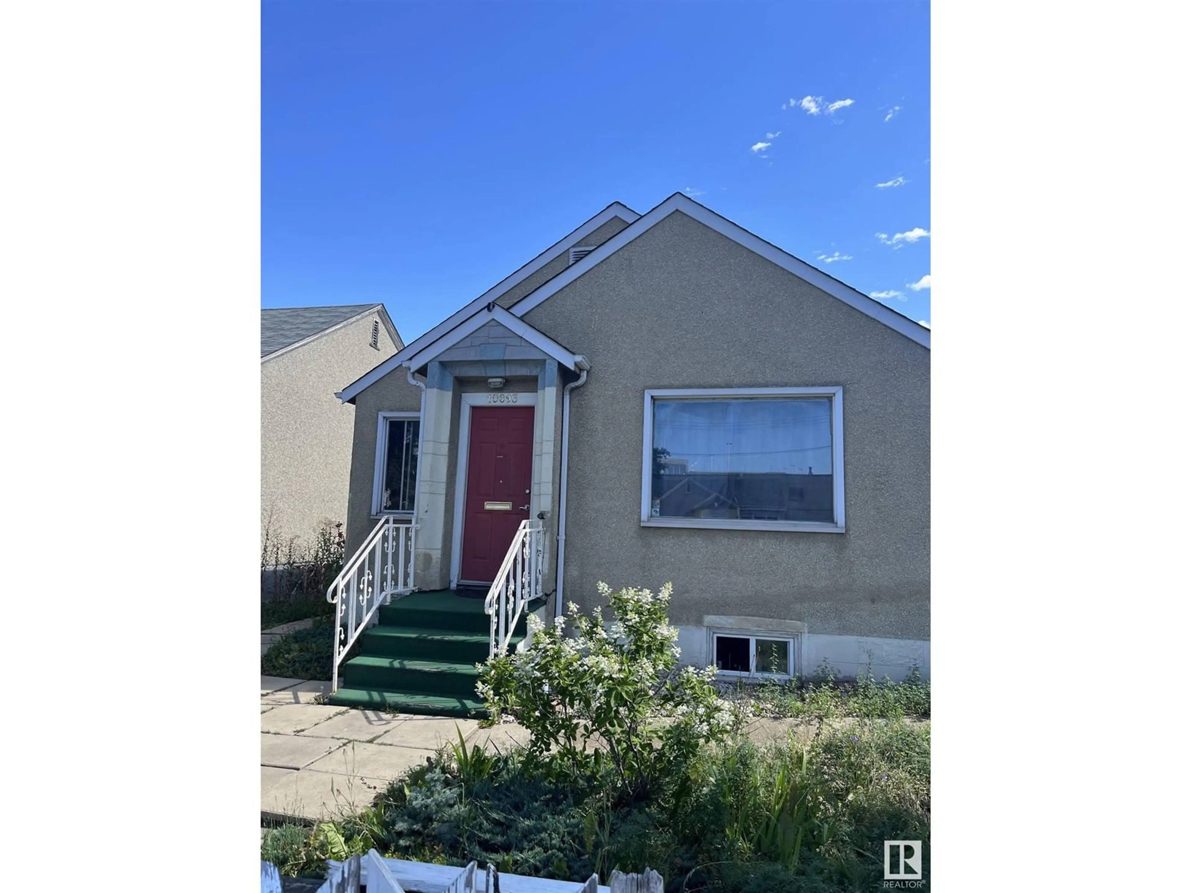 Frontside or backside of a home for 10893 98 ST NW, Edmonton Alberta T5H2P6