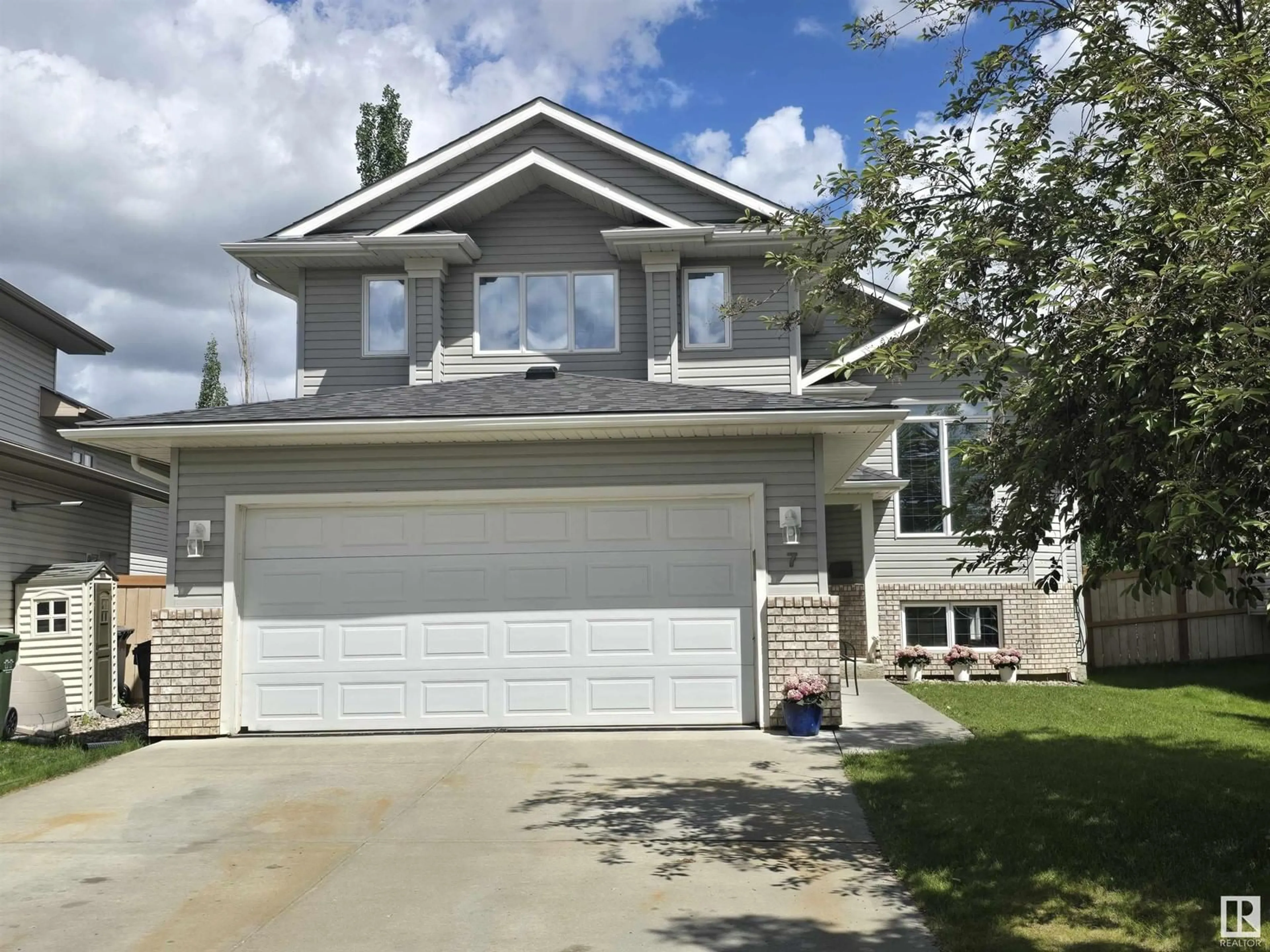 Frontside or backside of a home for 7 WILKINSON PL, Leduc Alberta T9E8N1