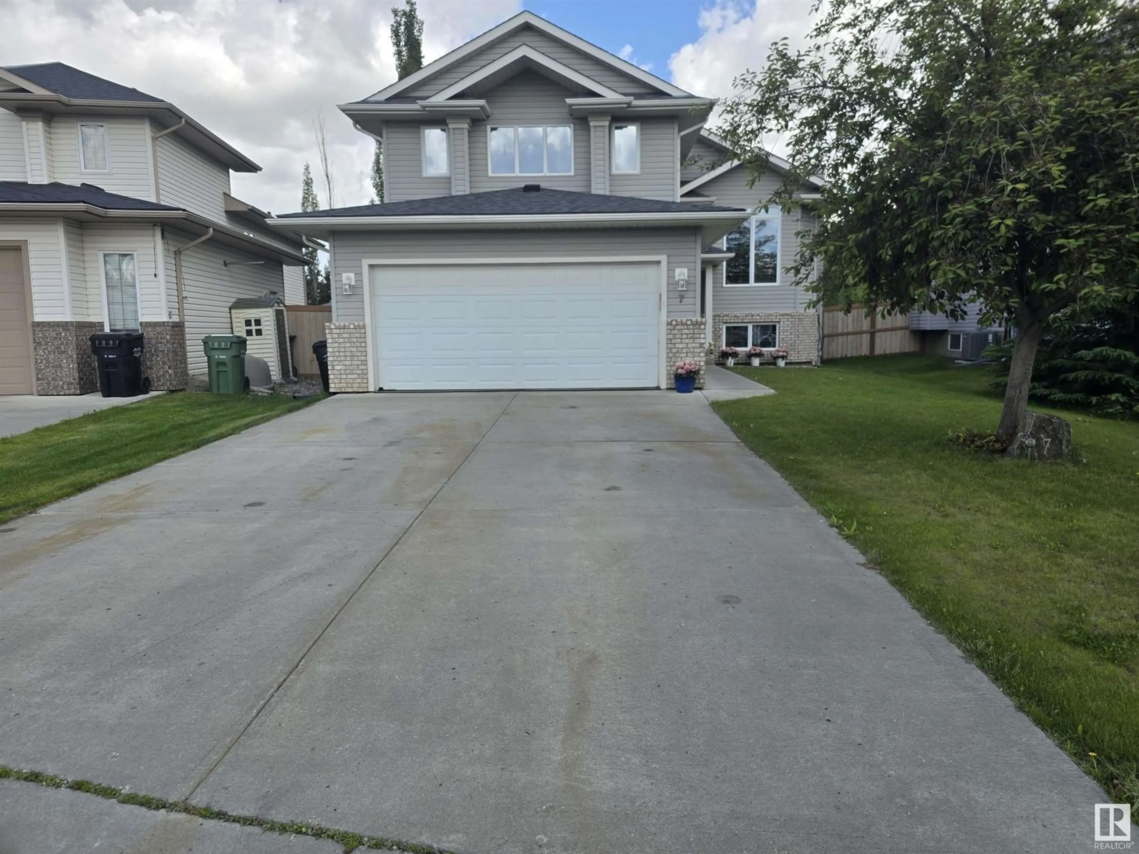 Frontside or backside of a home for 7 WILKINSON PL, Leduc Alberta T9E8N1