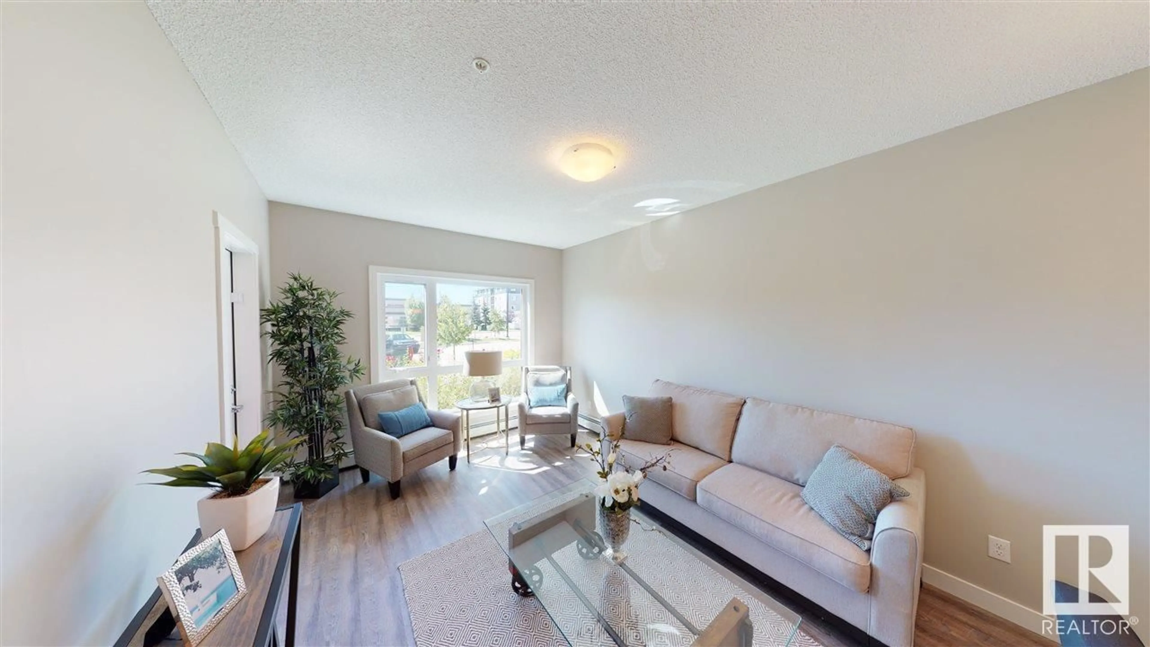 Living room for #121 12804 140 AV NW, Edmonton Alberta T6V0M3