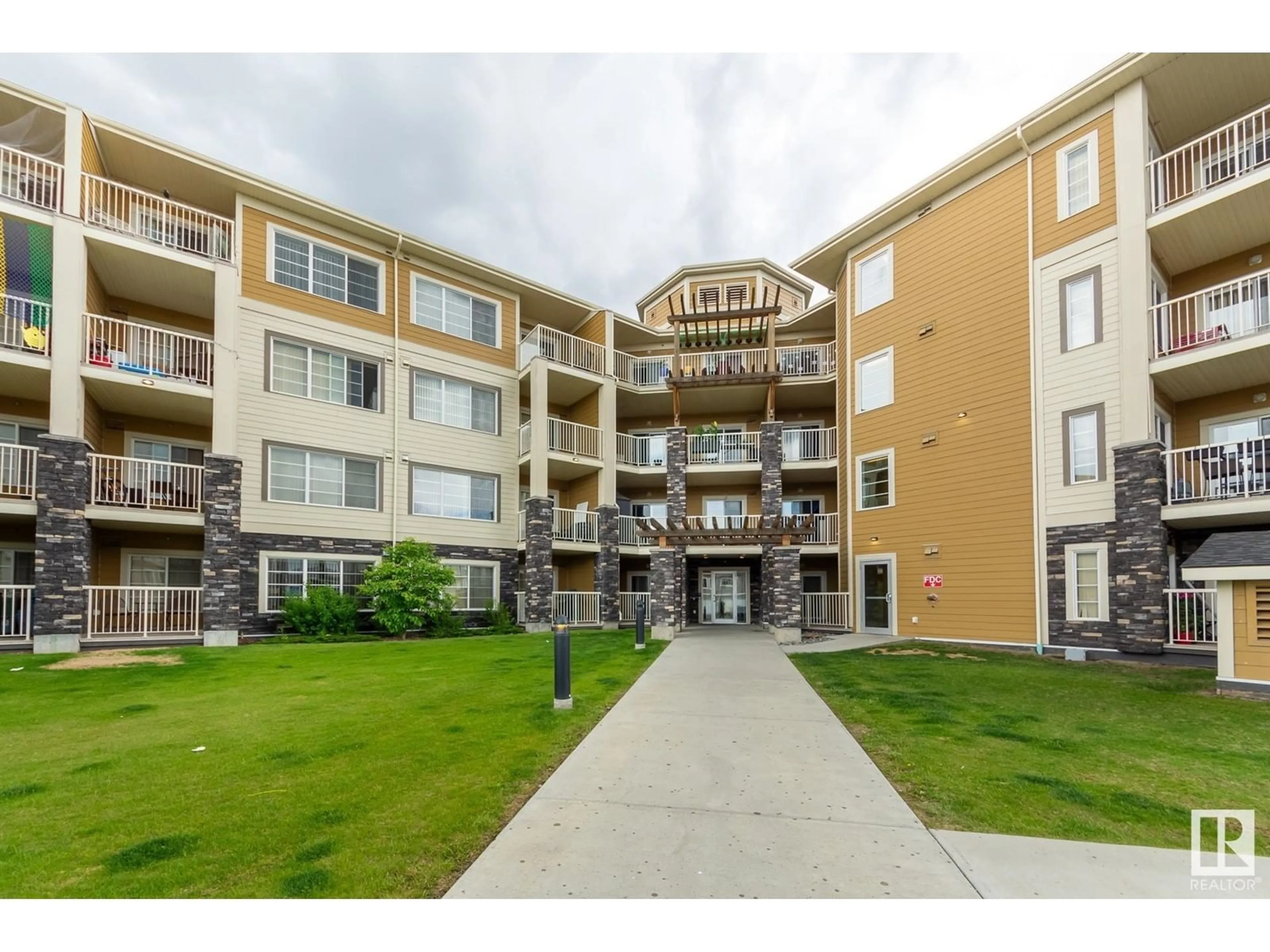 A pic from exterior of the house or condo for #410 3670 139 AV NW, Edmonton Alberta T5Y3N5