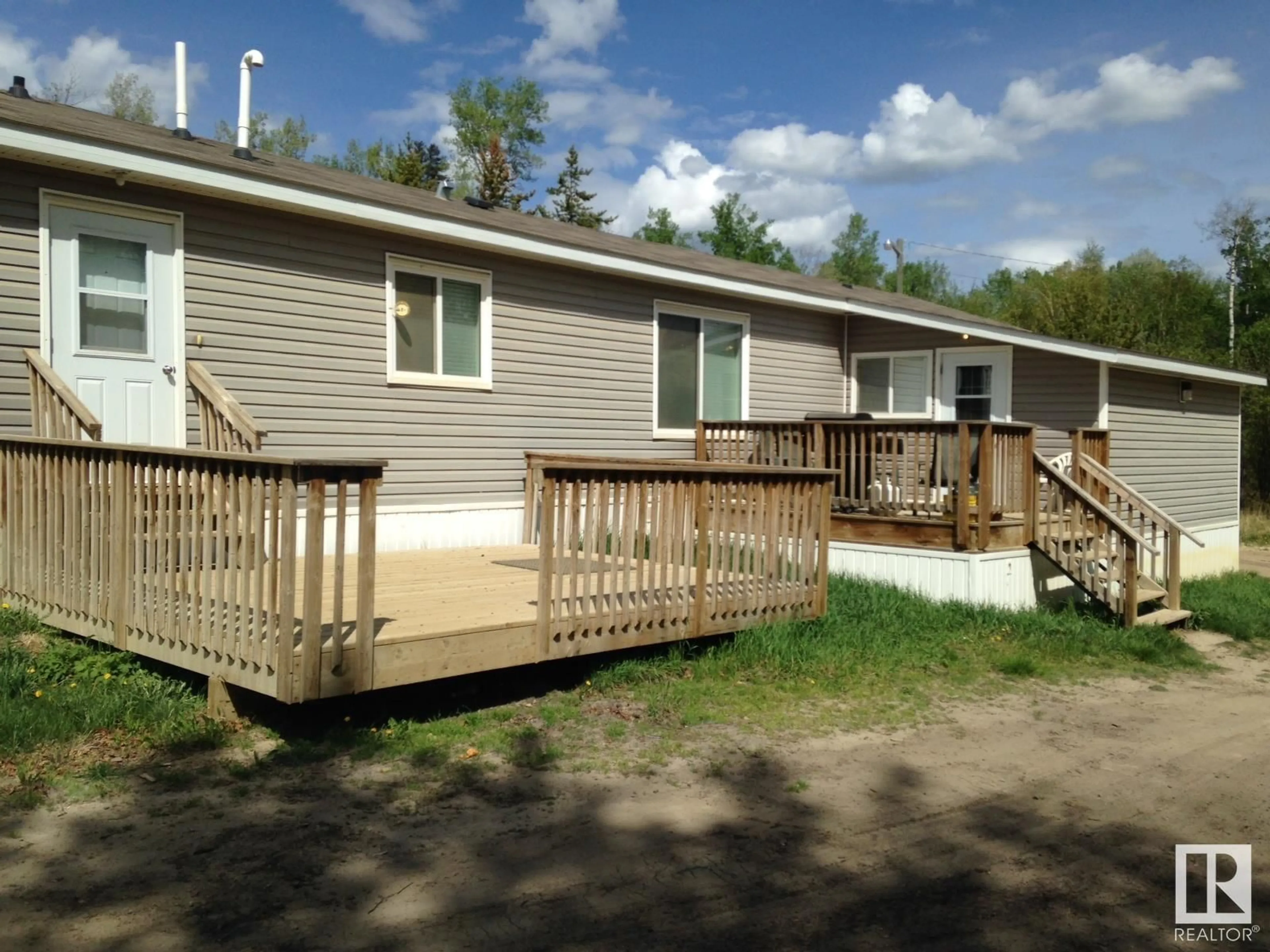 Frontside or backside of a home for 174 Pine LN, Conklin Alberta T0P1H1