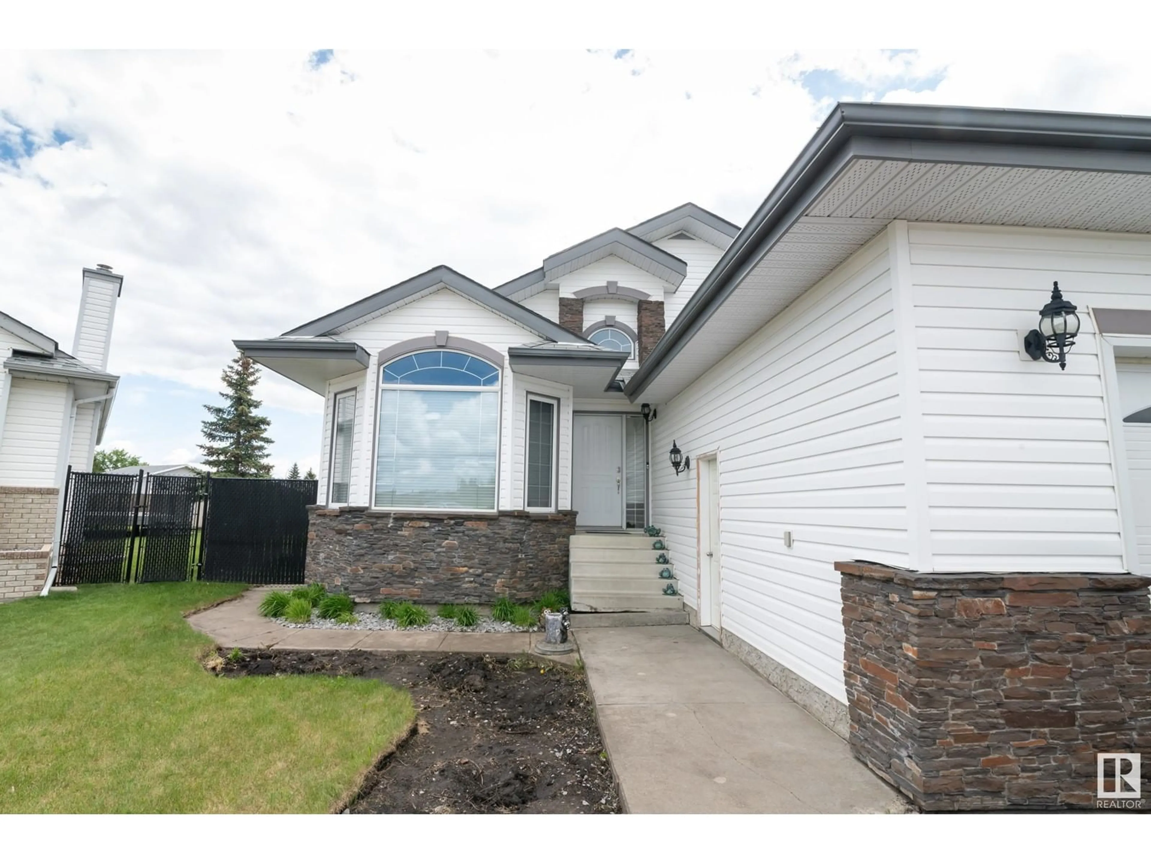 Frontside or backside of a home for 12 LAFOND DR, Tofield Alberta T0B4J0